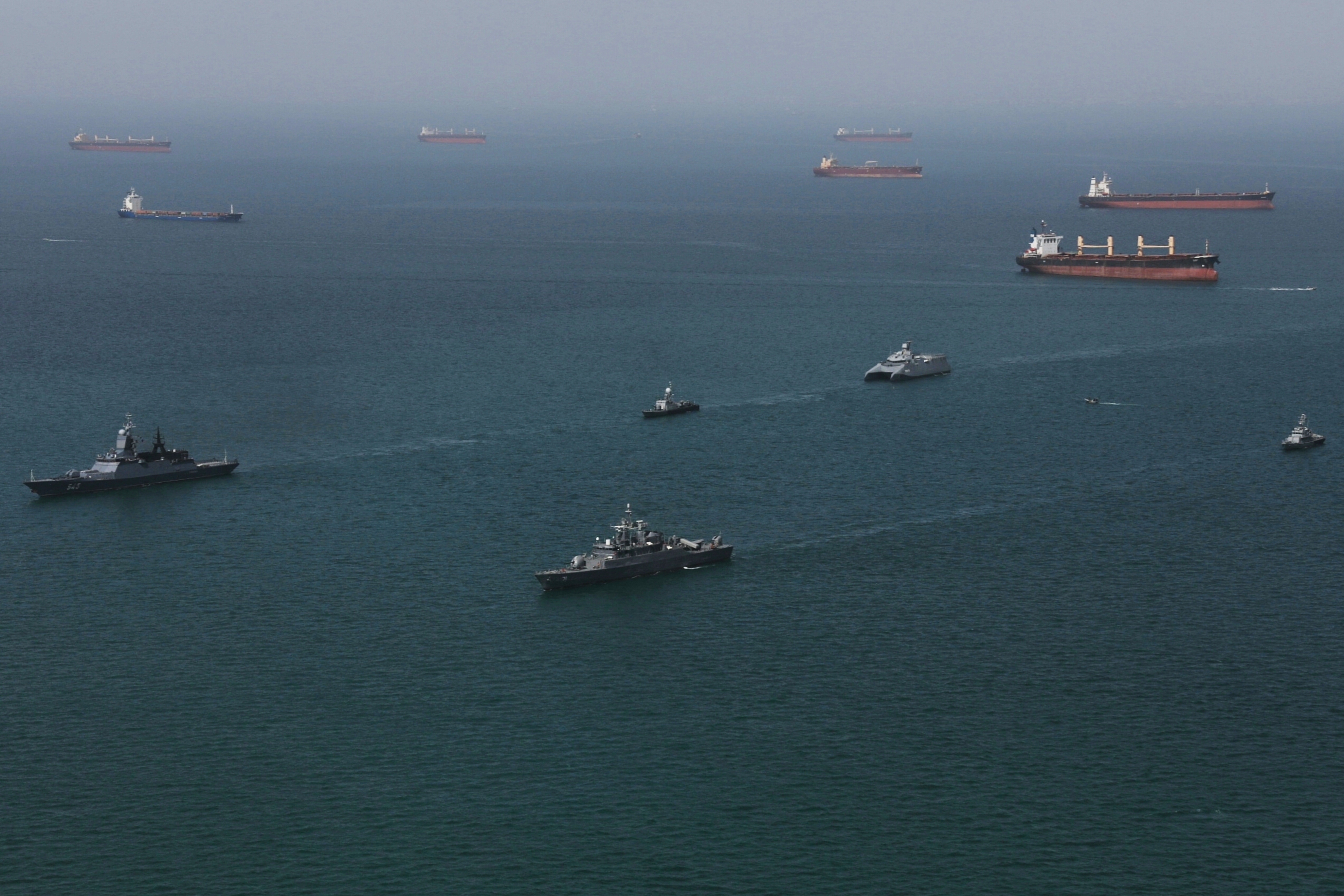 This image provided Thursday Feb. 19, 2026 by the Iranian military and dand dated Wednesday, Feb. 18, 2025, shows navy ships conducting operations during a join drill by Iranian and Russian forces in the Indian Ocean.(Masoud Nazari Mehrabi/Iranian Army via AP)