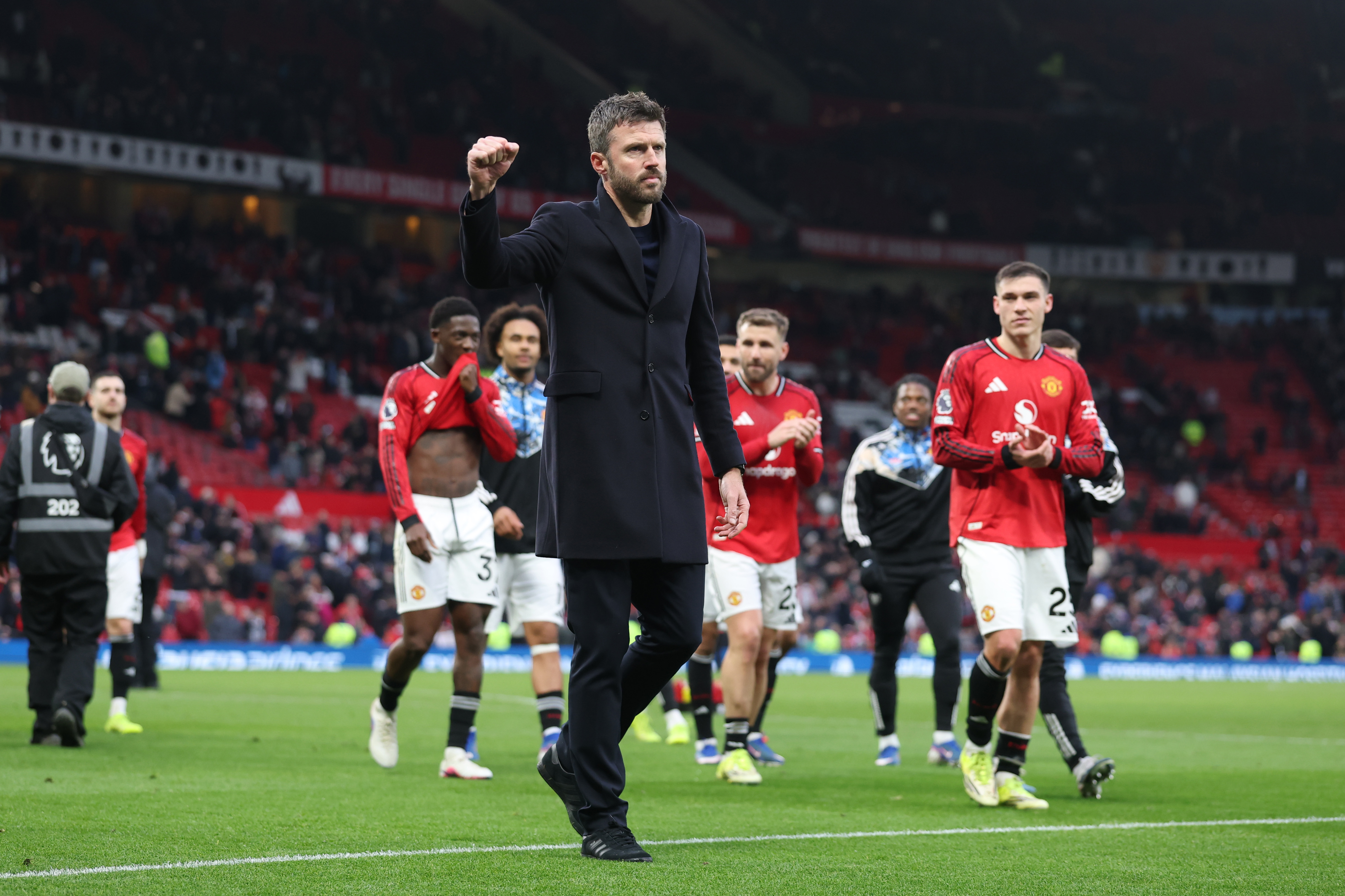 MANCHESTER, ENGLAND - FEBRUARY 01: Michael Carrick, Manager of Manchester United acknowledges the fans after the Premier League match between Manchester United and Fulham at Old Trafford on February 01, 2026 in Manchester, England. (Photo by Carl Recine/Getty Images)