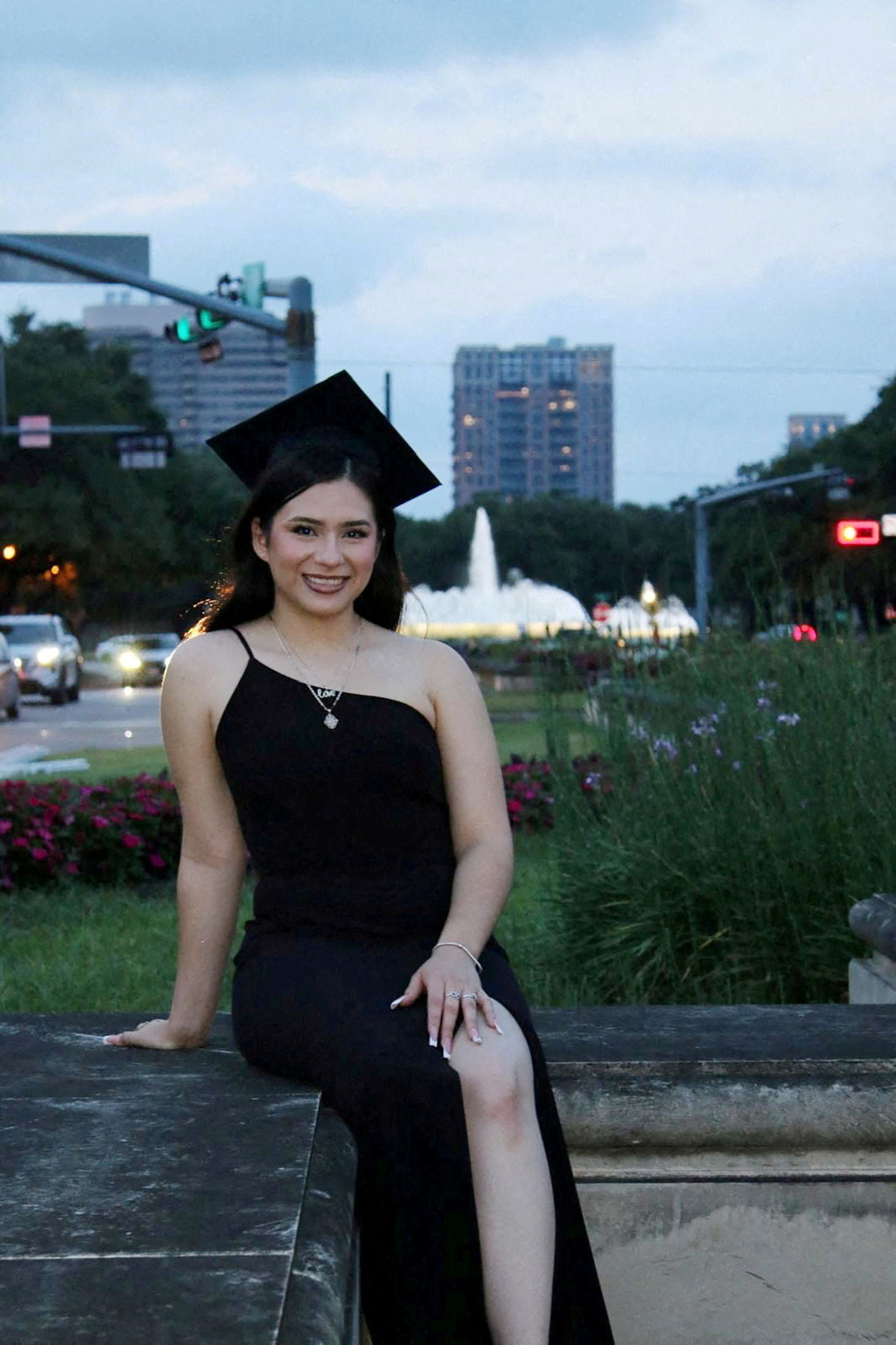 FILE PHOTO: Babson College student Any Lucia Lopez Belloza poses wearing a mortarboard after graduating from high school in Boston, Massachusetts, U.S., in 2025. massdeportationdefense.org/Handout via REUTERS/File Photo
