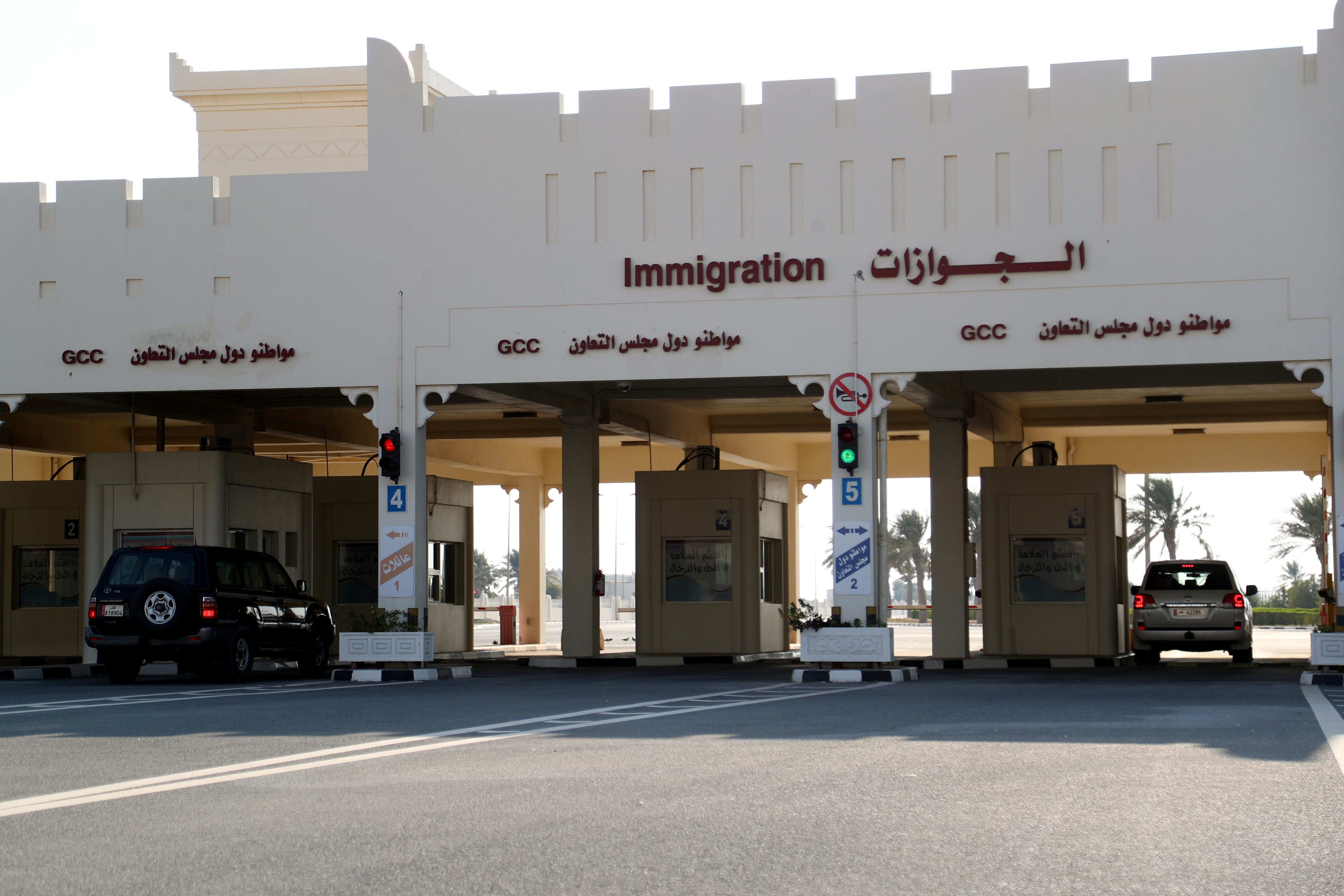 Cars move at Qatar's Abu Samra border crossing with Saudi Arabia. [Ibraheem Al Omari/REUTERS]