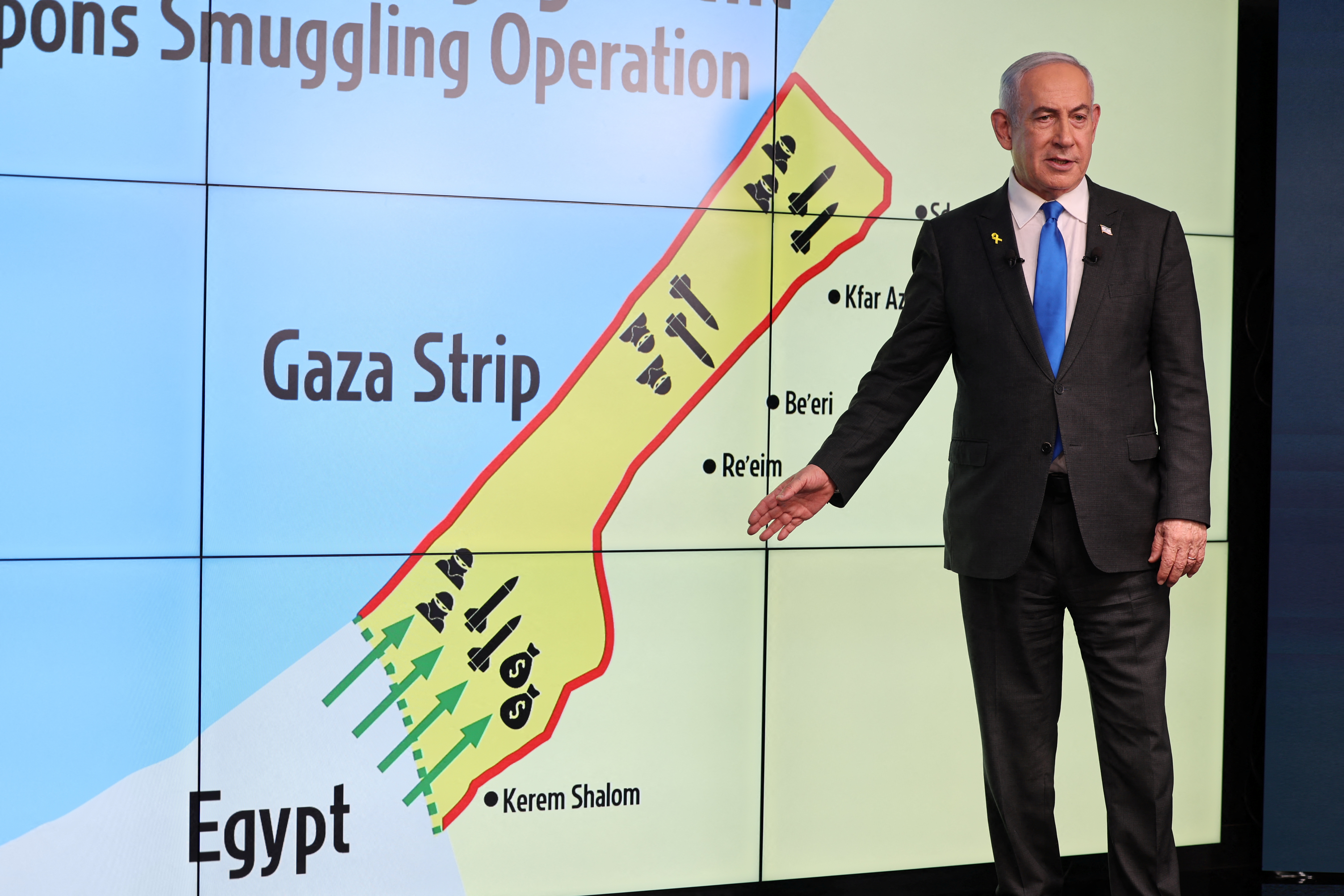 Israeli Prime Minister Benjamin Netanyahu stands before a map showing the Gaza Strip, during a press conference for the international media at the Government Press office in Jerusalem, amid the Israel-Hamas conflict, 04 September 2024. [Abir Sultan/ Reuters]