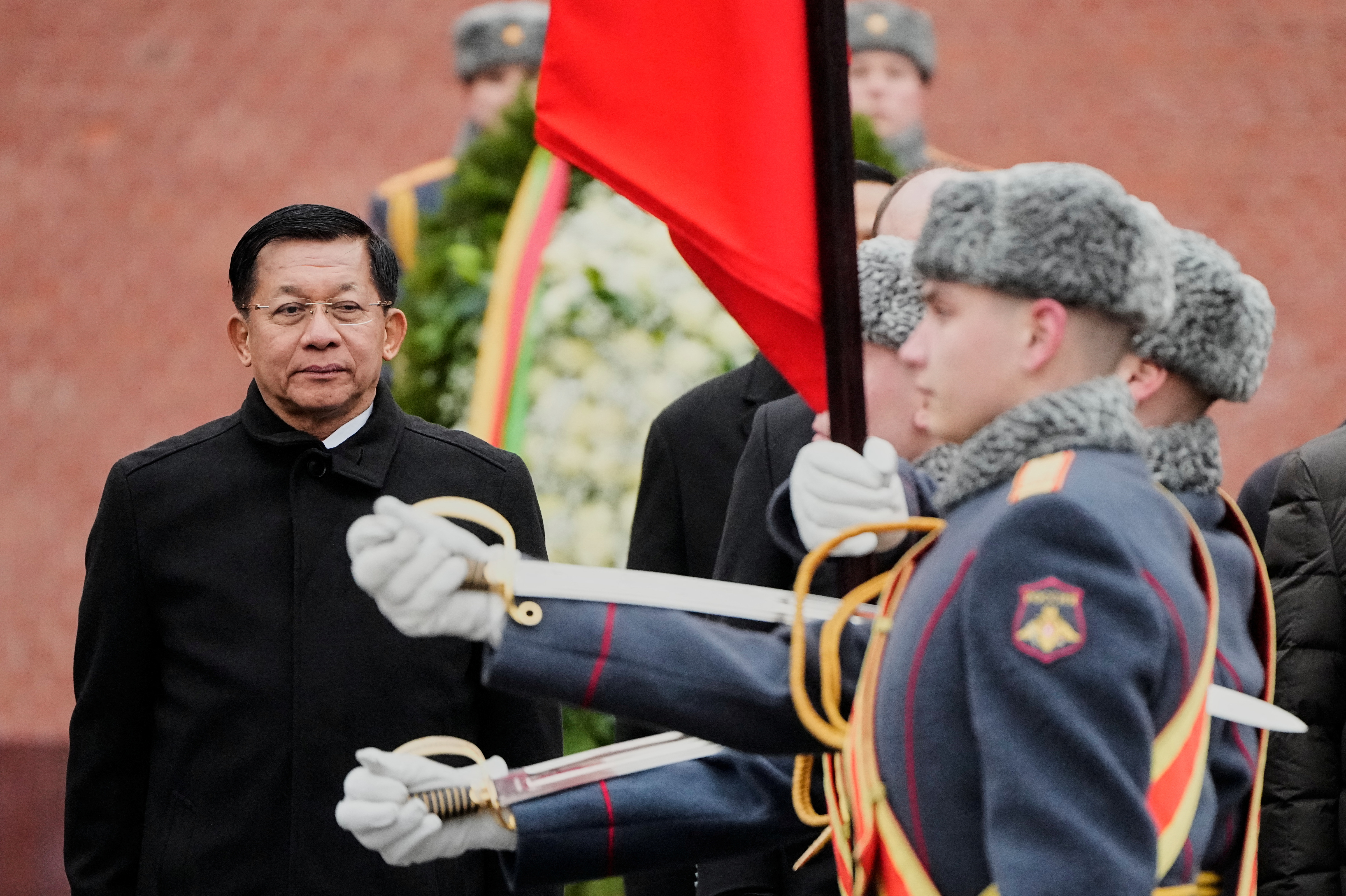 Myanmar's military chief Senior General Min Aung Hlaing watches Russian honour guards passing by during a wreath-laying ceremony at the Tomb of the Unknown Soldier near the Kremlin Wall in central Moscow, Russia, March 4, 2025. Alexander Zemlianichenko/Pool via REUTERS