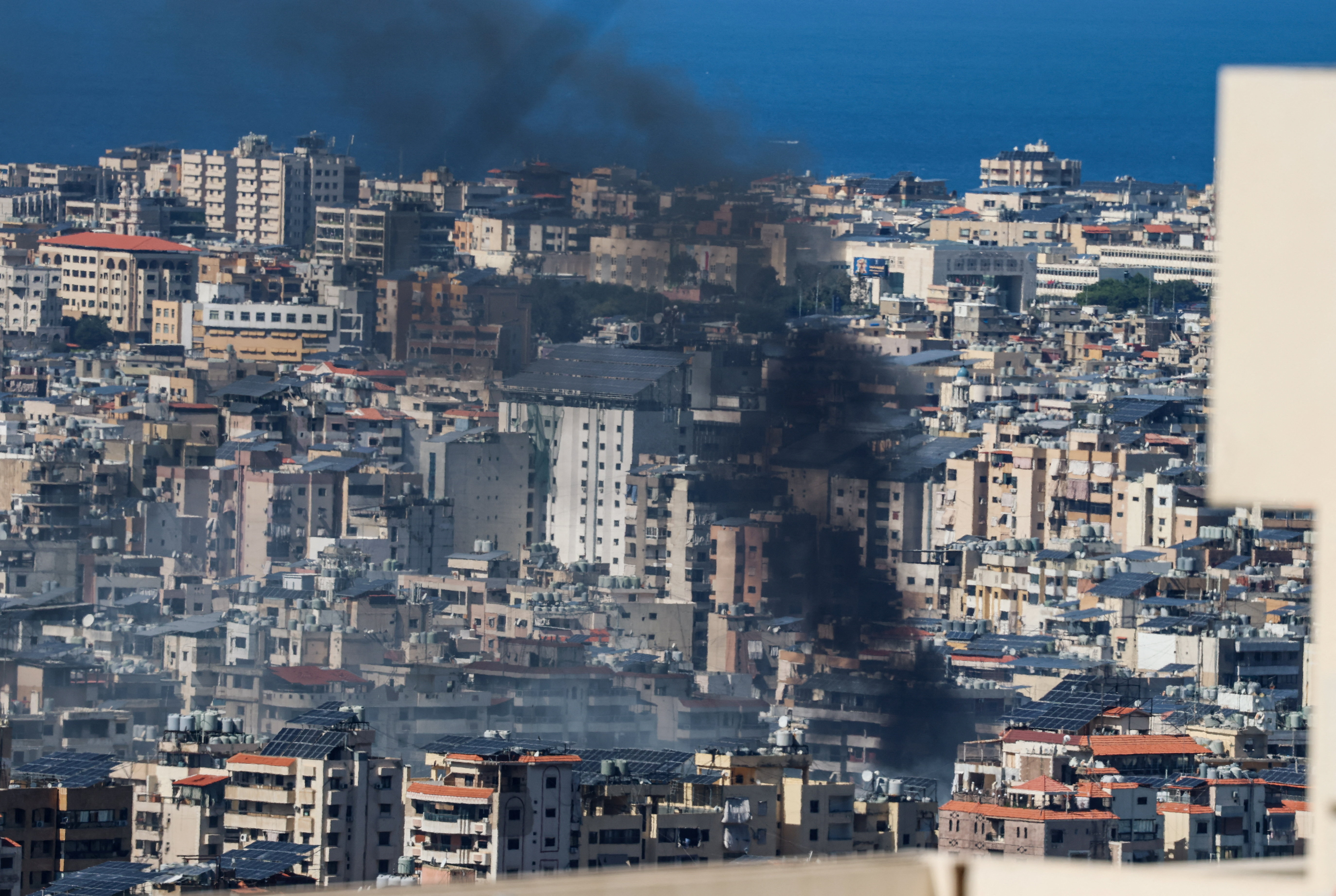 Smoke rises after an Israeli strike on Beirut's southern suburbs