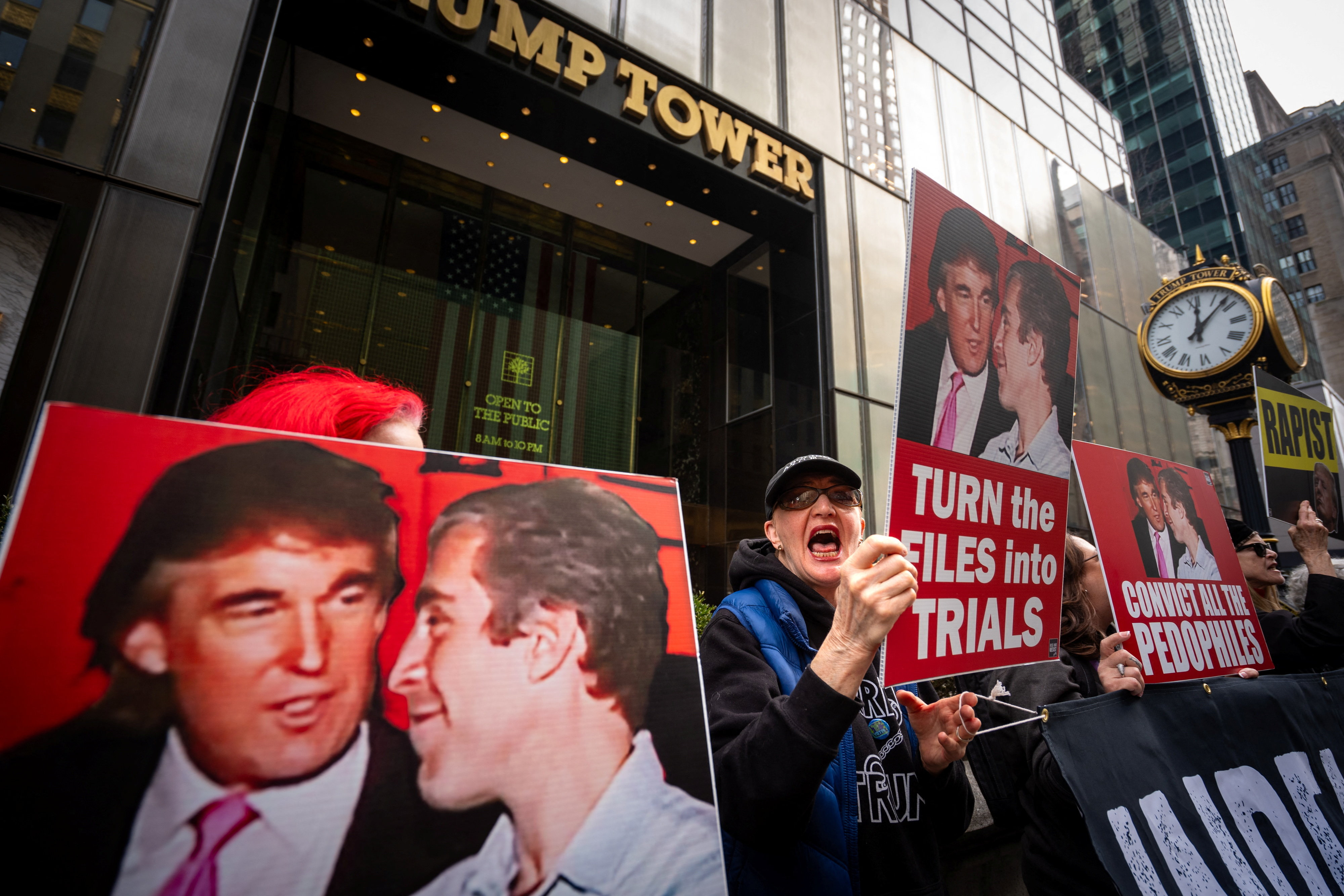 People protest outside Trump Tower during a ‘Believe Survivors’ demonstration against US President Donald Trump and the late convicted sex offender Jeffrey Epstein on International Women’s Day in New York City, on March 8, 2026