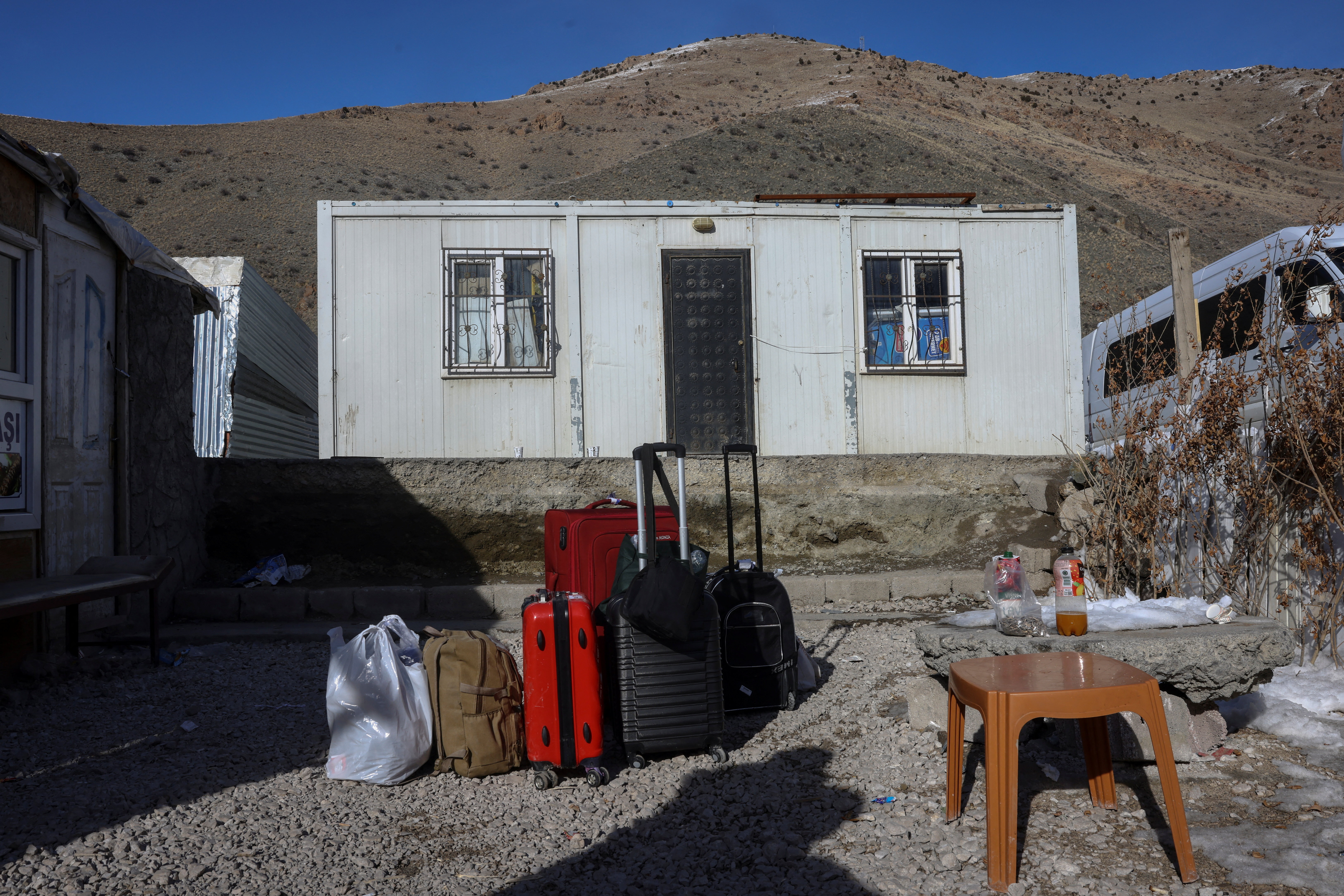 Iranians make their way after crossing into Turkey at the Kapikoy Border Gate in the eastern Van province