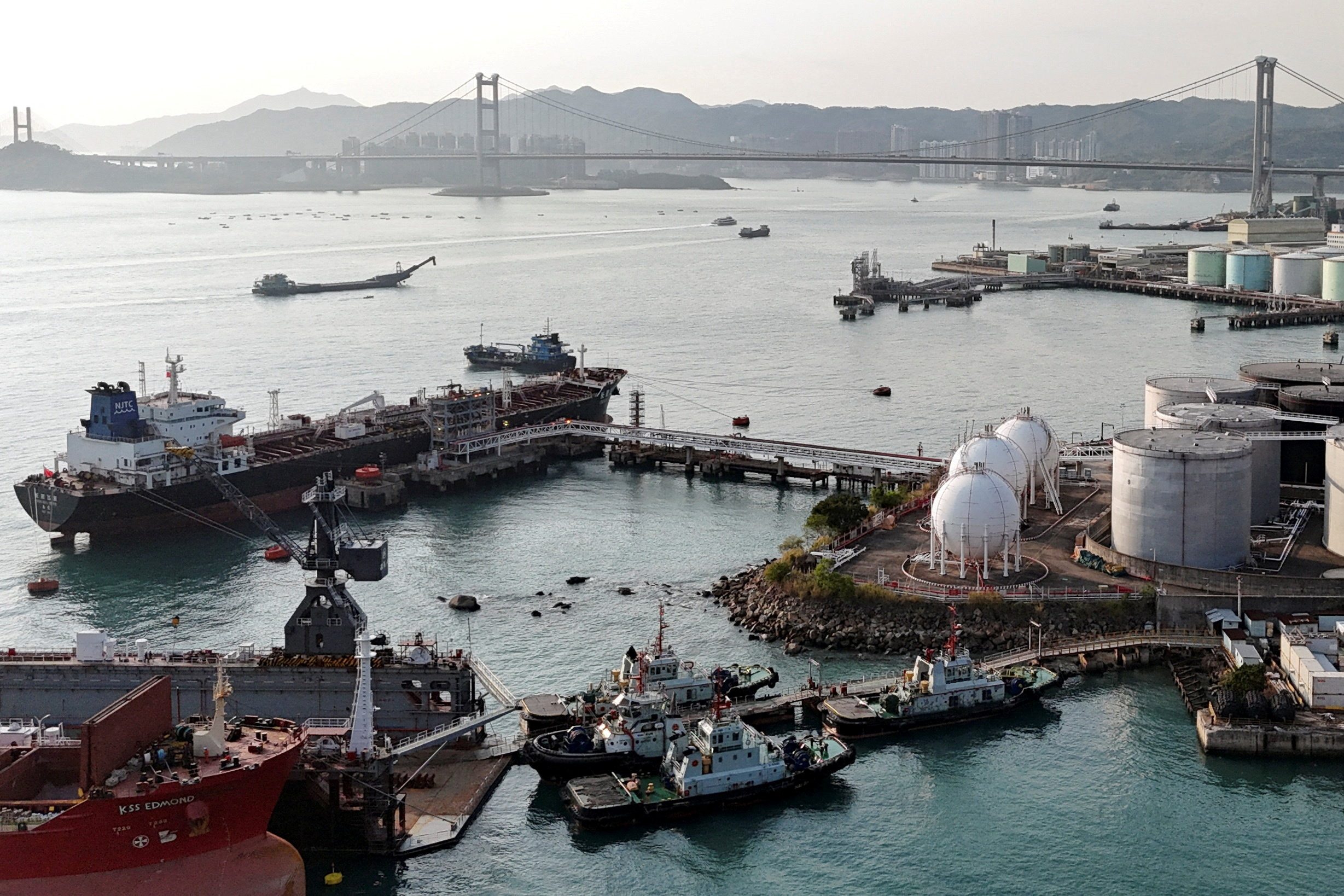 FILE PHOTO: A drone view shows a Chinese-flagged oil tanker moored at an oil terminal at Tsing Yi port, with Tsing Ma bridge in the background, in Hong Kong, China March 19, 2026. REUTERS/Joyce Zhou/File Photo