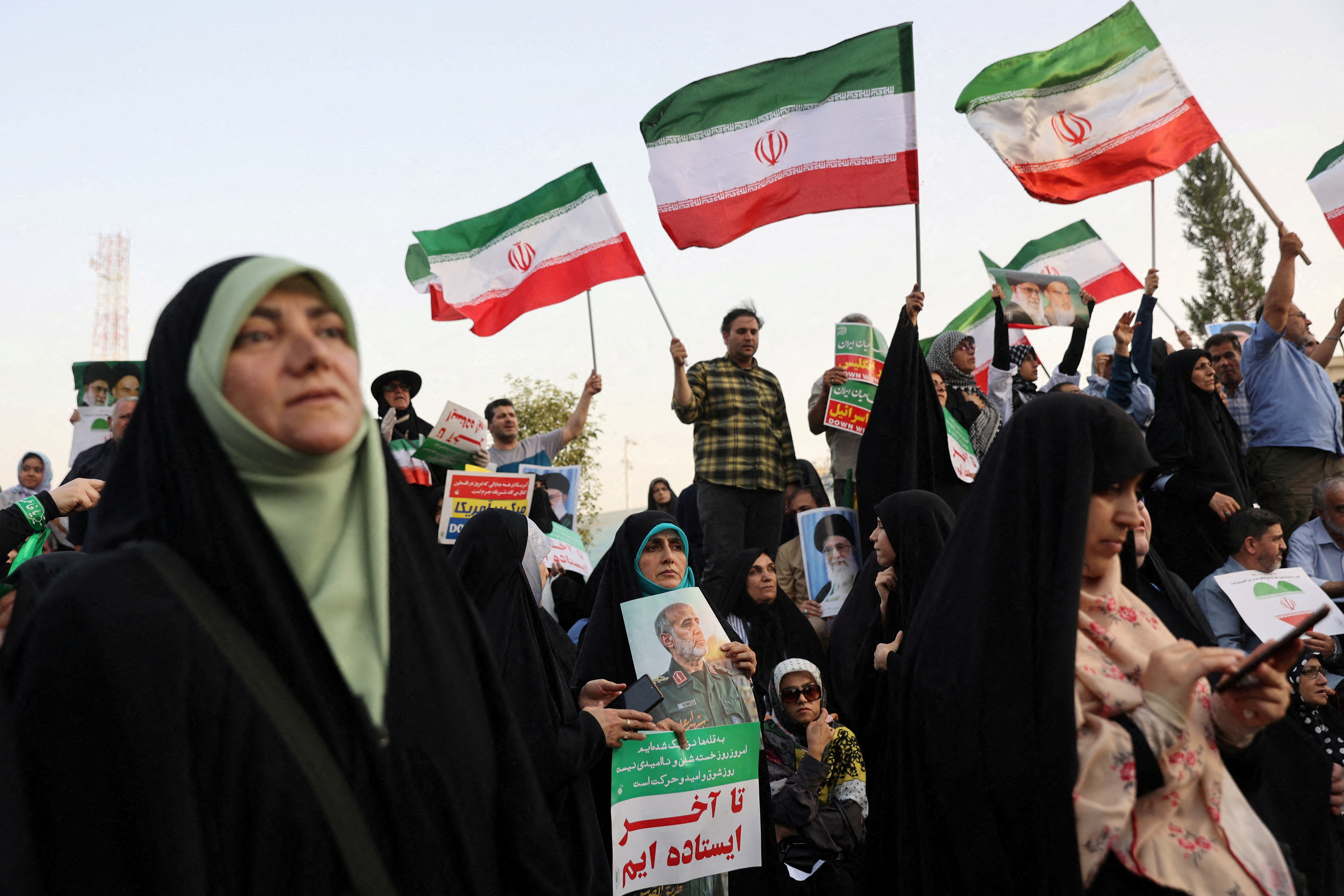 People attend a gathering to support Iran's Armed Forces, after US President Donald Trump announced a ceasefire between Israel and Iran, in Tehran, Iran, June 24, 2025. [Majid Asgaripour/Reuters]