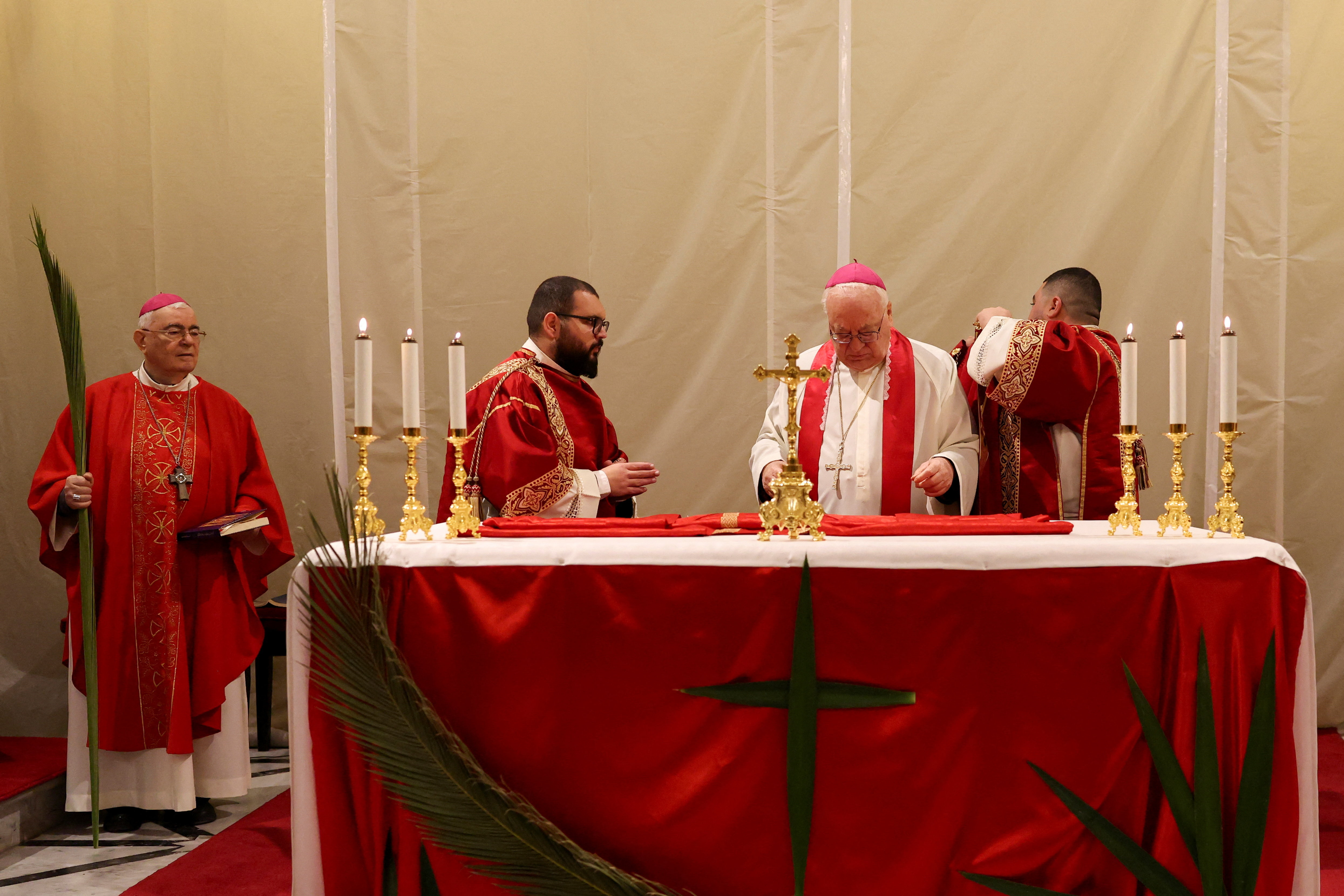 Christian worshippers mark Palm Sunday, following the cancellation of the traditional Palm Sunday procession from the Mount of Olives, amid restrictions on gathering in large groups