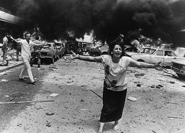 A woman cries in shock, minutes after a car bomb exploded in a crowded neighborhood of mainly-Moslem West Beirut 08 August 1986