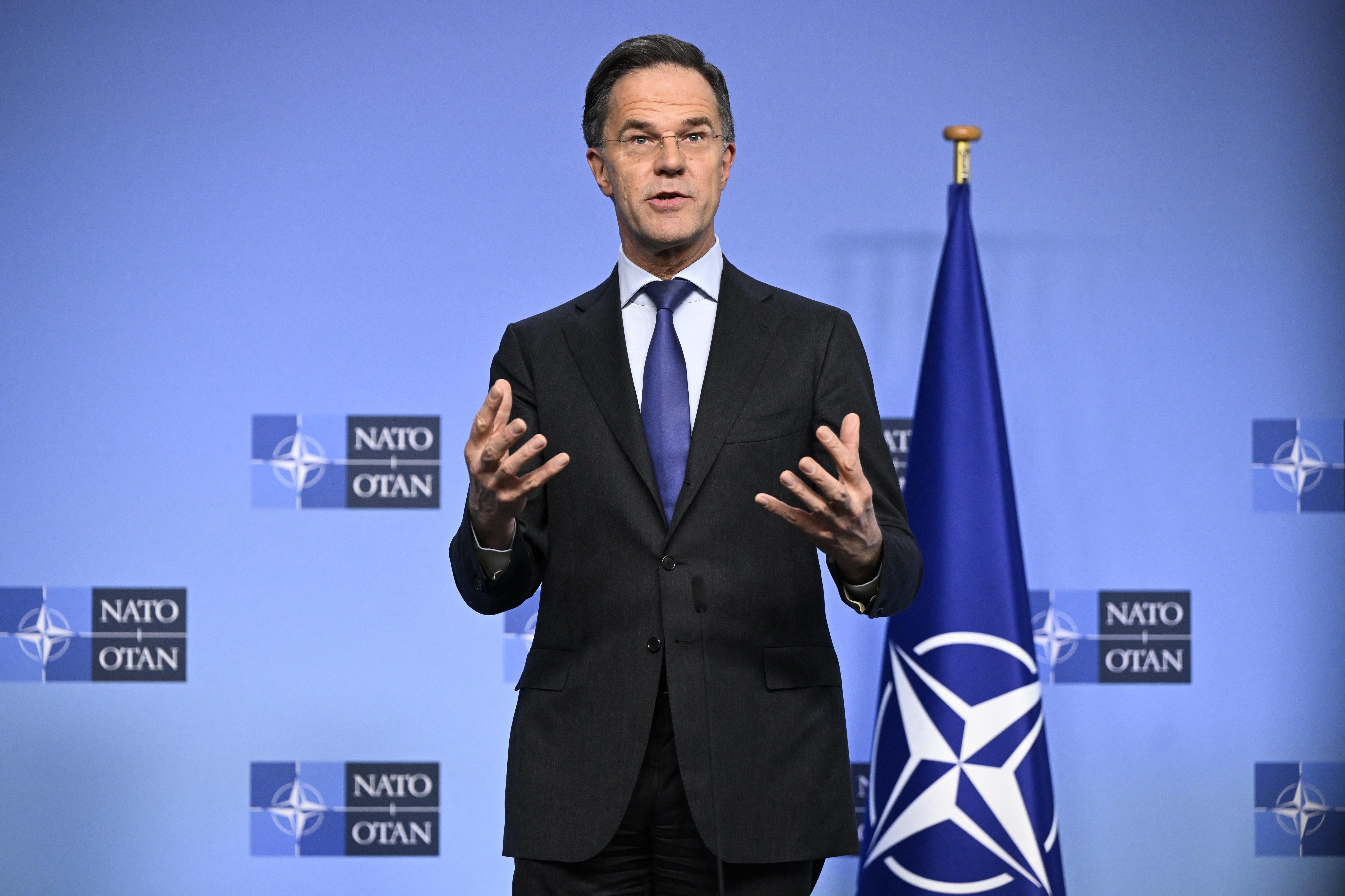 NATO Secretary General Mark Rutte speaks during a joint press conference with Ukraine's Defence Minister on the sidelines of a defence ministers meeting of The North Atlantic Treaty Organisation (NATO) at NATO Headquarters in Brussels, on February 12, 2026. (Photo by JOHN THYS / AFP)