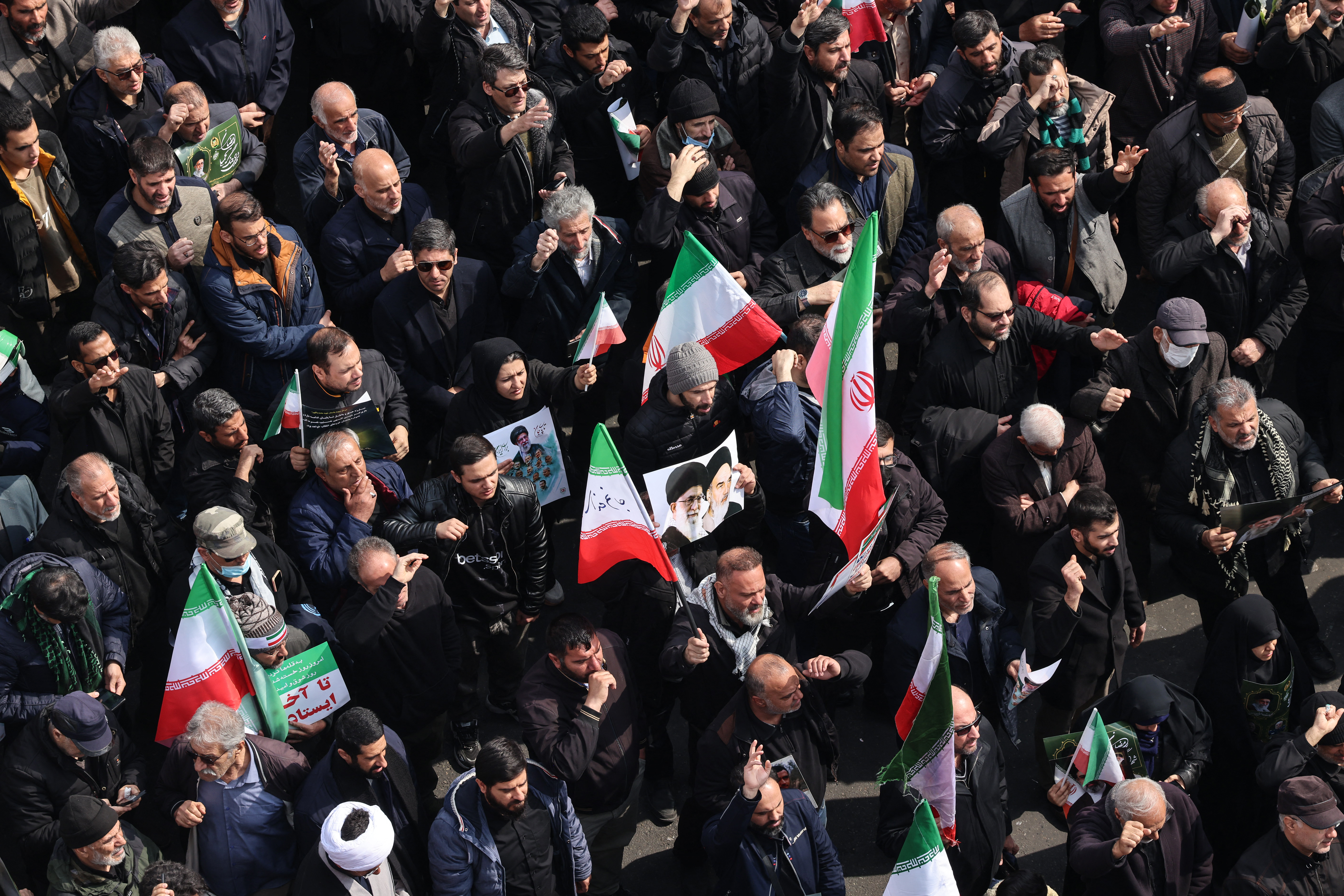 Iranians in Tehran at the funerals of Iran’s Revolutionary Guards Corps (IRGC) commanders, army officers and others killed in the early days of the United States and Israeli strikes on Iran, March 11, 2026 [AFP]