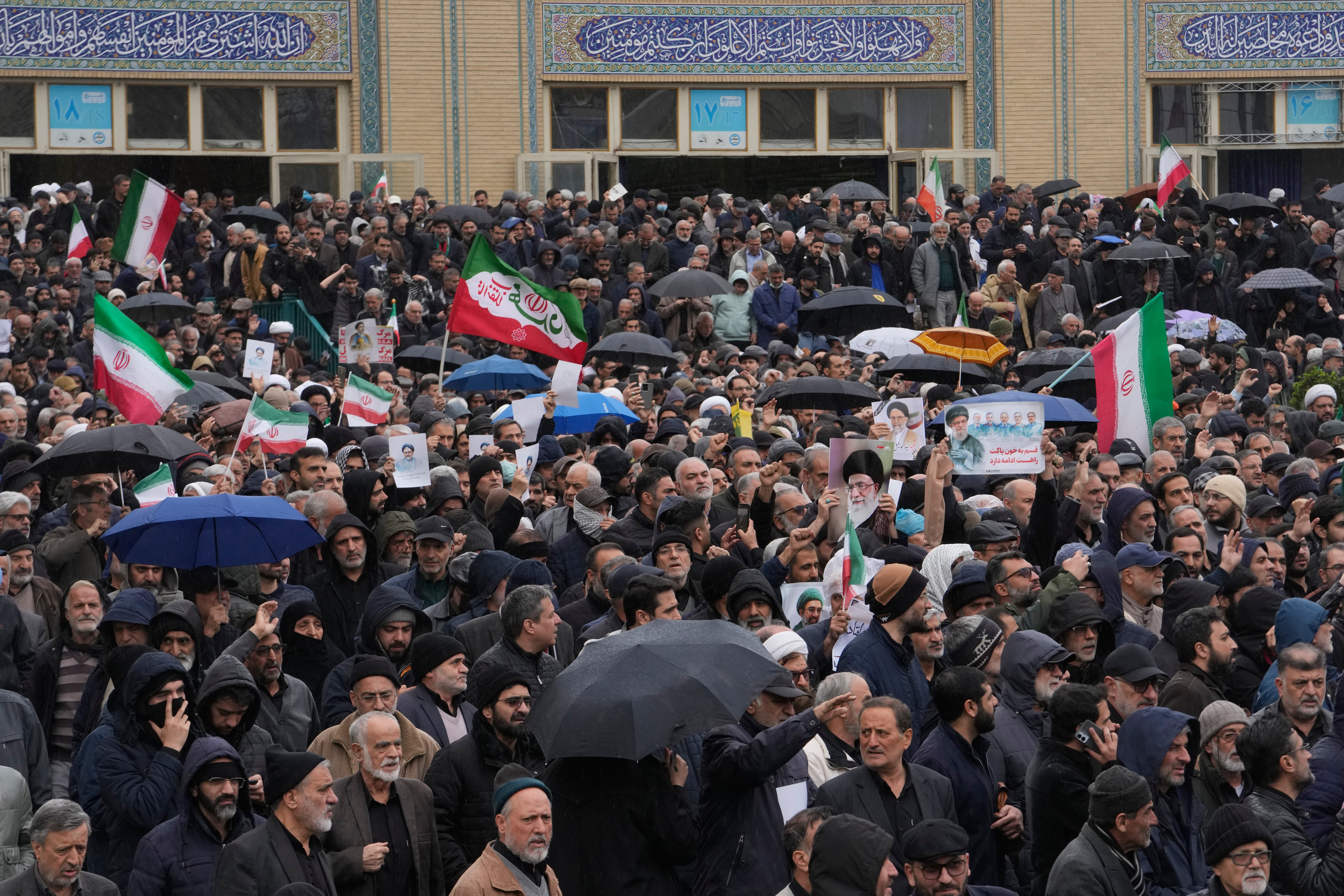 Iranians attend the funeral procession of Iran's intelligence minister Esmail Khatib and his family, killed in US-Israeli attacks, at the Imam Khomeini Grand Mosque in Tehran, Iran, Friday, March 20, 2026. [Vahid Salemi/AP Photo]