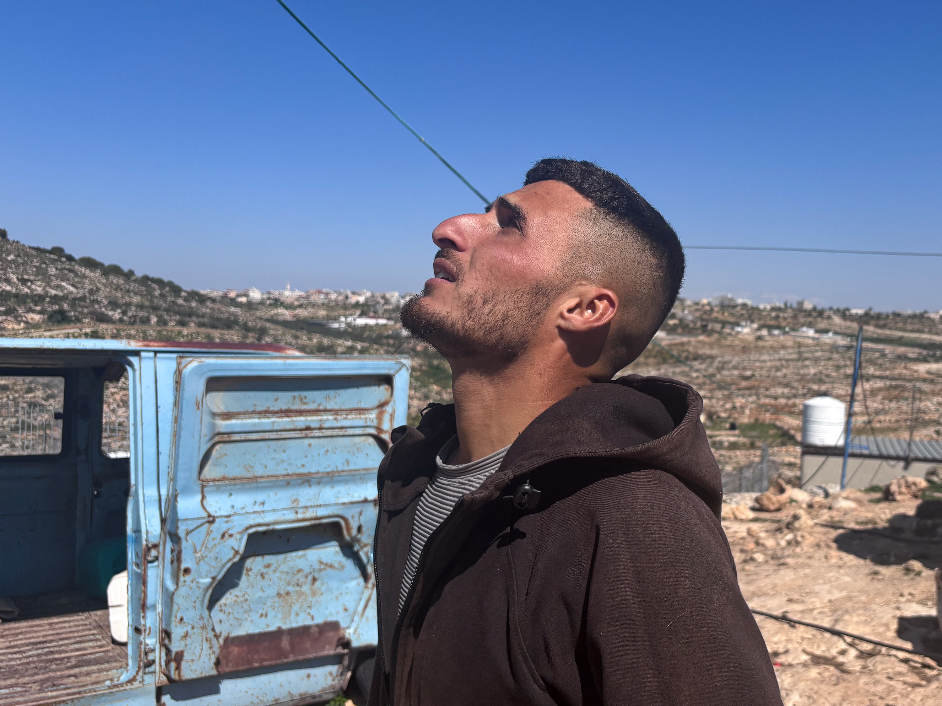 Thabet looking up at rocket-1772695674