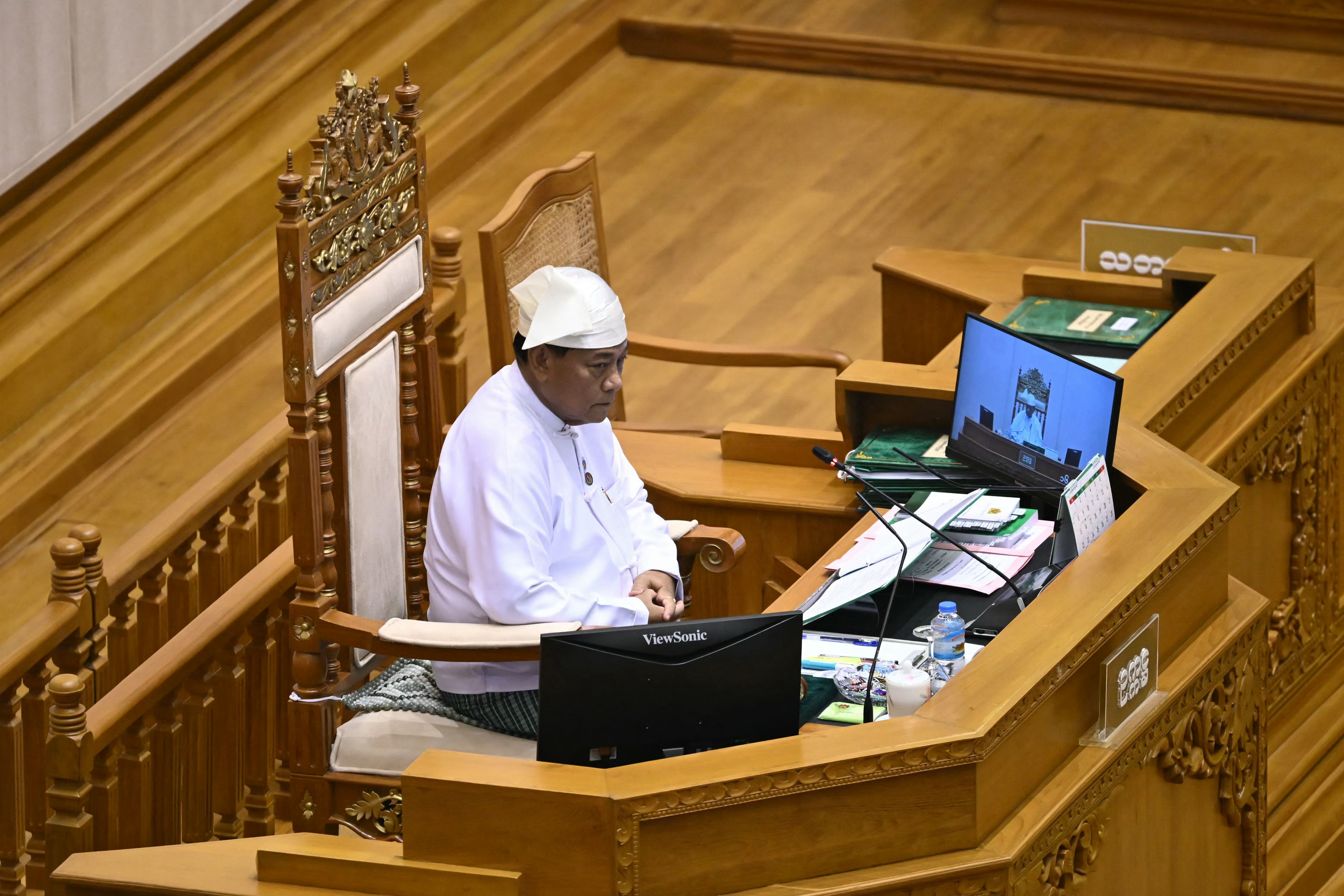 Union Solidarity and Development Party (USDP) Chairman U Khin Yi, elected as Speaker of the Pyithu Hluttaw (House of Representatives), sits during a session of the Pyithu Hluttaw's third term in Naypyidaw on March 16, 2026.