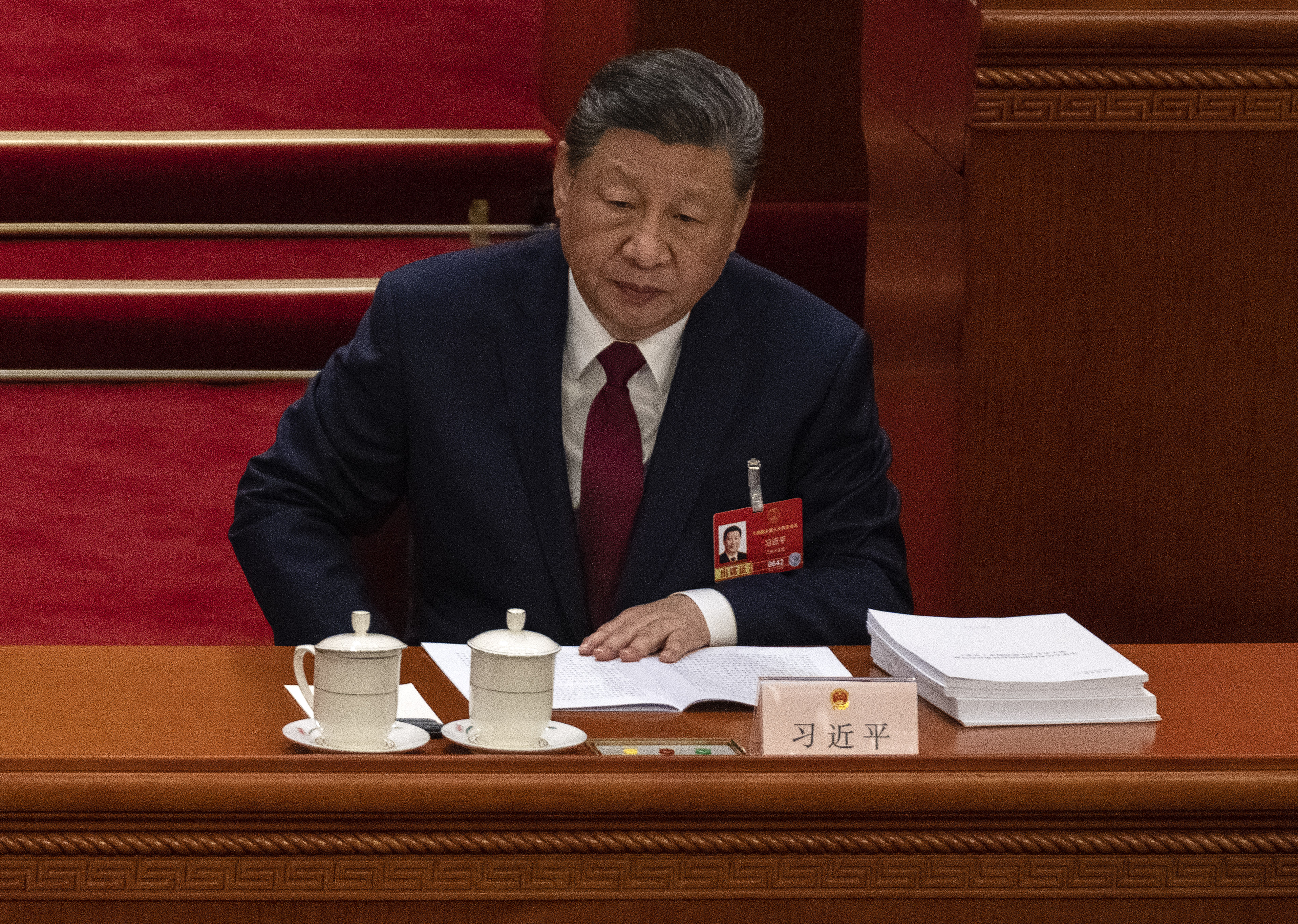 BEIJING, CHINA - MARCH 5: Chinese President Xi Jinping listens during speeches to the opening session of the National People's Congress at the Great Hall of the People on March 5, 2026 in Beijing, China. China's annual political gatherings, which includes the important National People's Congress (NPC), and is known as the Two Sessions, convenes leaders and lawmakers to set the government's agenda for domestic economic and social development for the year. The meetings are expected to close by March 12th. (Photo by Kevin Frayer/Getty Images)