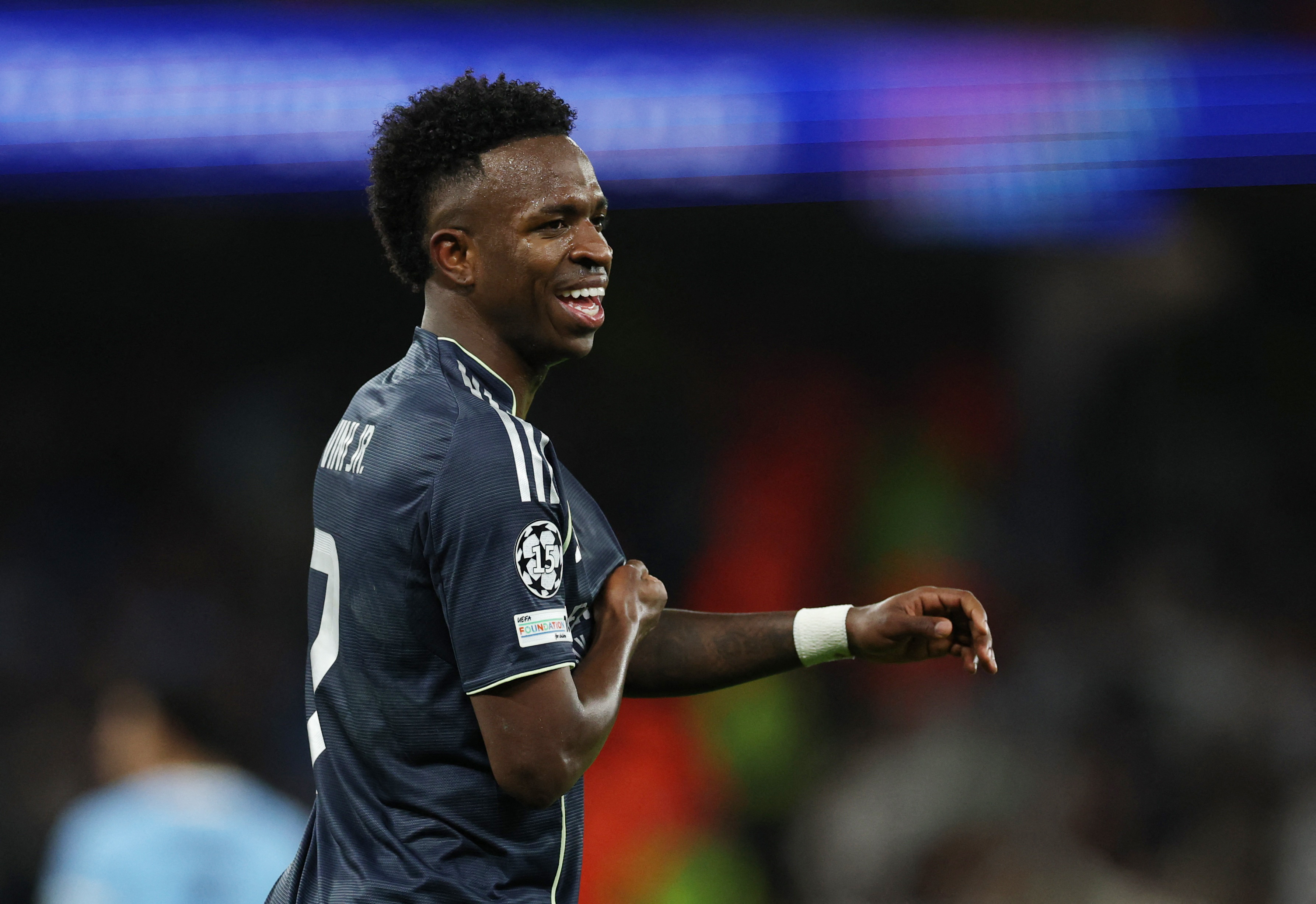 Real Madrid's Vinicius Junior celebrates scoring their second goal.