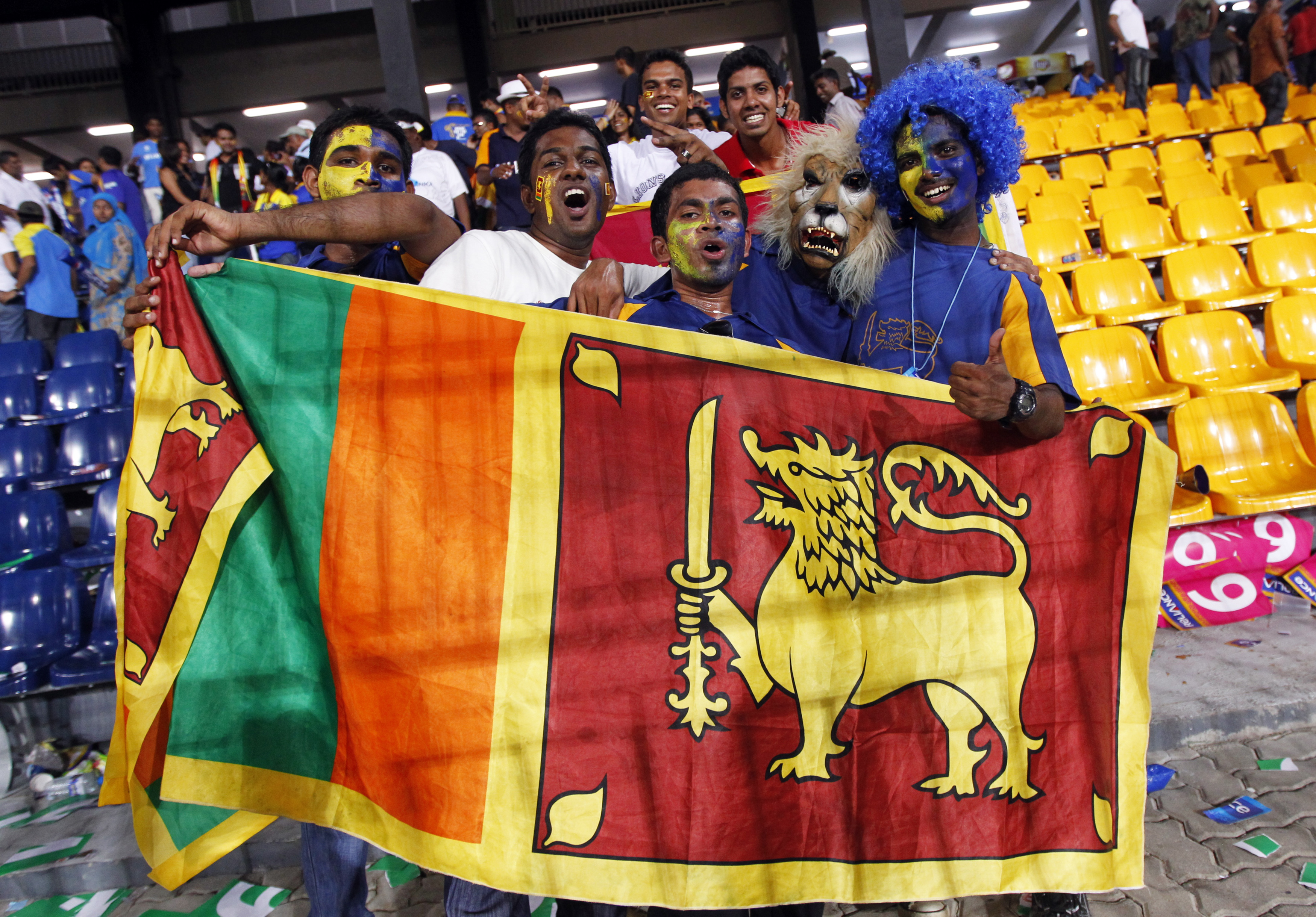 Sri Lanka fans celebrate with a national flag.