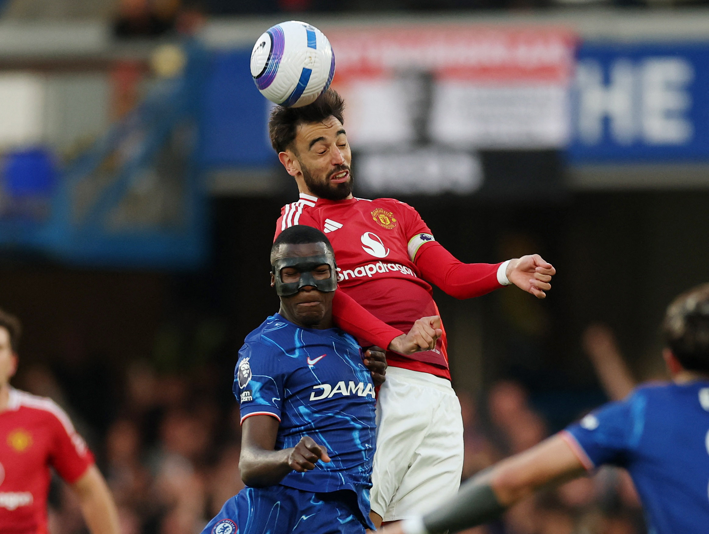 Chelsea's Moises Caicedo in action with Manchester United's Bruno Fernandes