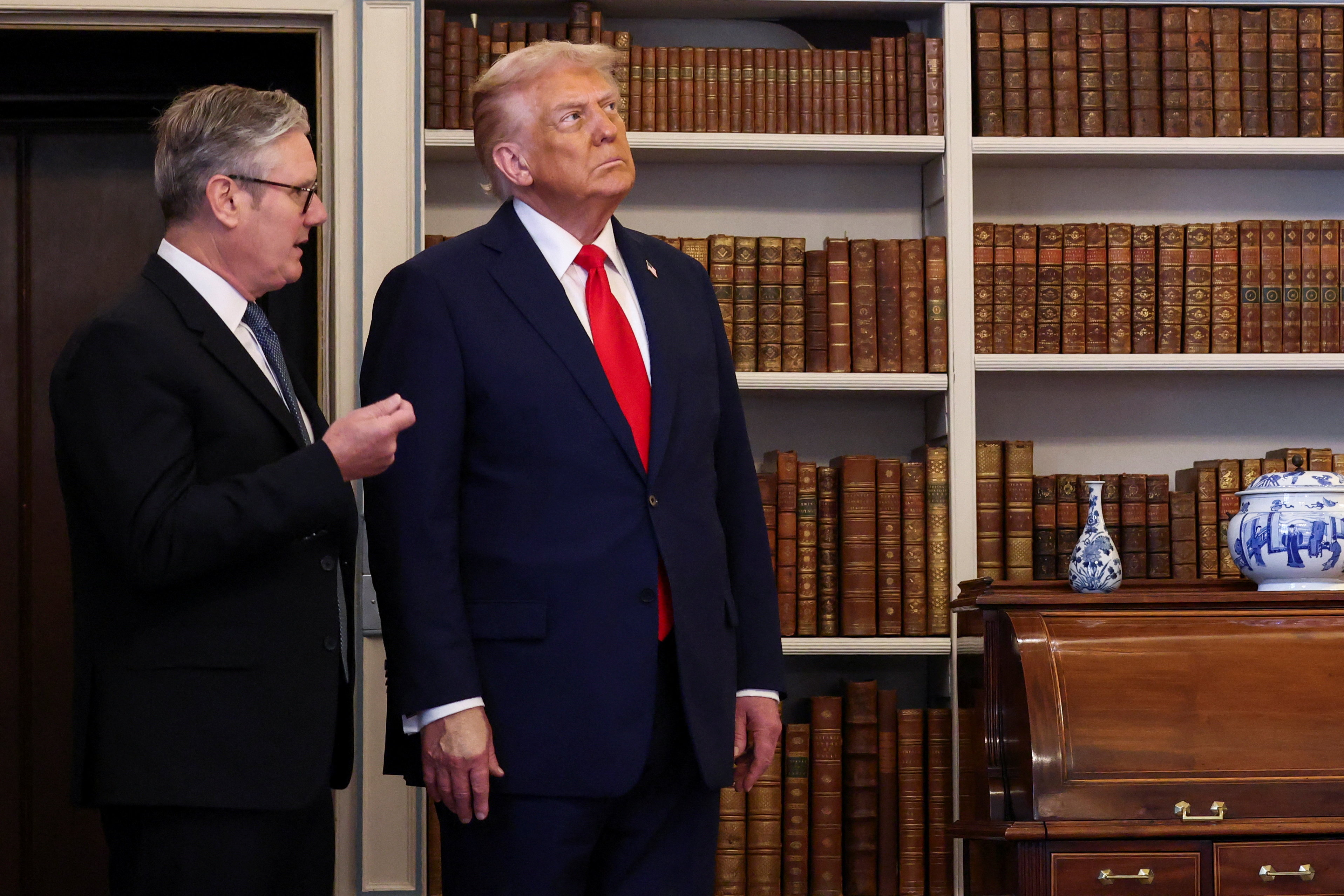 British Prime Minister Keir Starmer gestures next to U.S. President Donald Trump during their meeting at Chequers, near Aylesbury, Britain, September 18, 2025. REUTERS/Kevin Lamarque