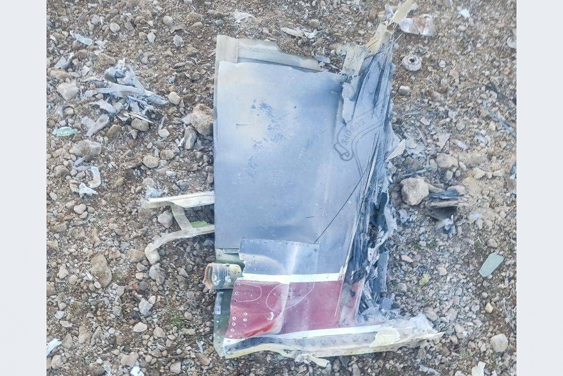 The Iranian state media said to show fragments of a downed U.S. jet in this picture said to be taken in central Iran and released on April 3, 2026. IRIB/Handout via REUTERS THIS IMAGE HAS BEEN SUPPLIED BY A THIRD PARTY. IRAN OUT. NO COMMERCIAL OR EDITORIAL SALES IN IRAN. NO USE BBC PERSIAN. NO USE VOA PERSIAN. NO USE MANOTO. NO USE IRAN INTERNATIONAL. NO USE RADIO FARDA. REFILE - CORRECTING FROM "JETS" TO "JET" VERIFICATION: -Reuters was not able to confirm the location or date when the photos were taken. -The red stripe seen on the tail fin of the plane in the photos is consistent with the tail section of a F-15E Strike Eagle seen in file photos.
