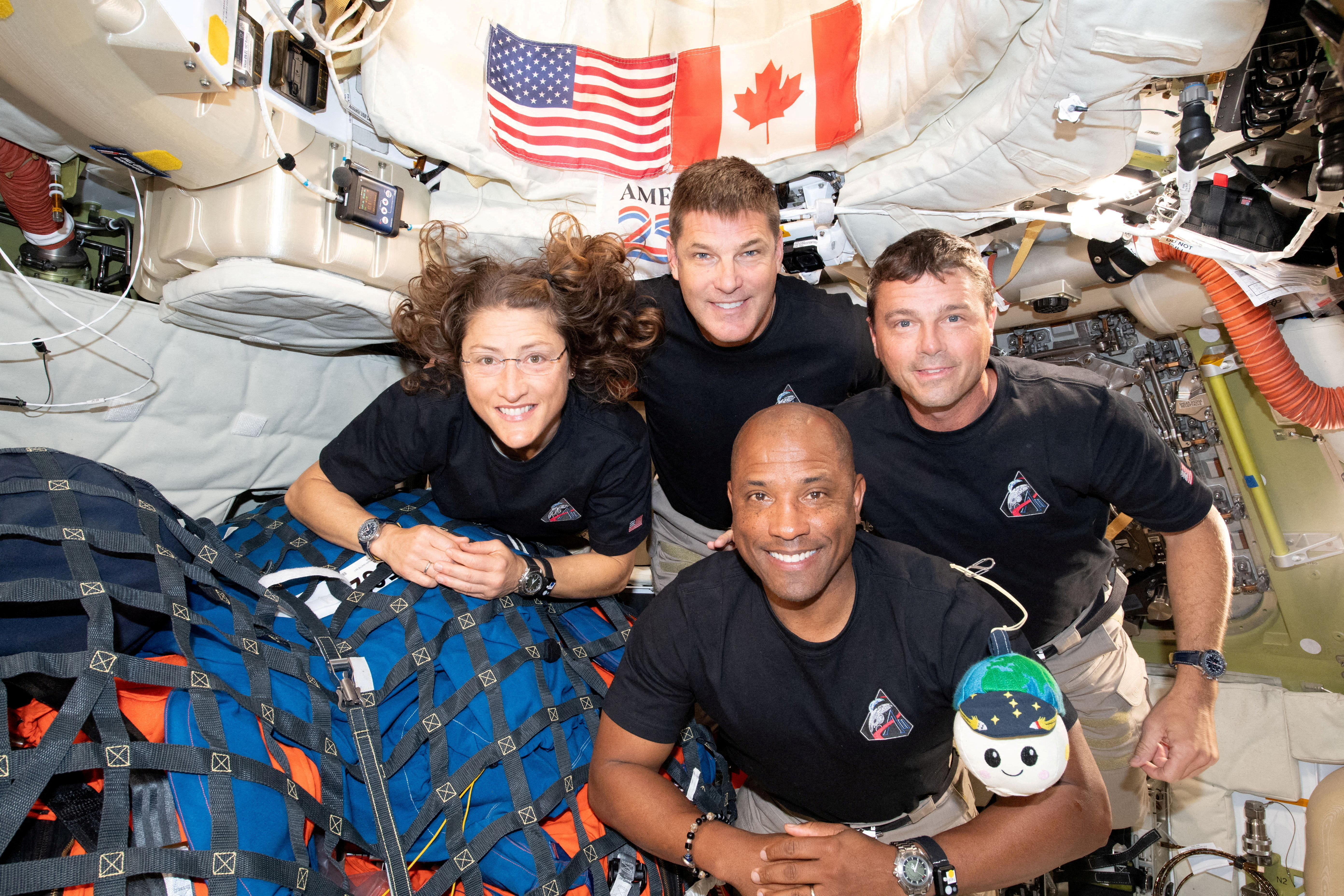 The NASA Artemis II crew, Mission Specialist Christina Koch, Mission Specialist Jeremy Hansen, Commander Reid Wiseman, and Pilot Victor Glover