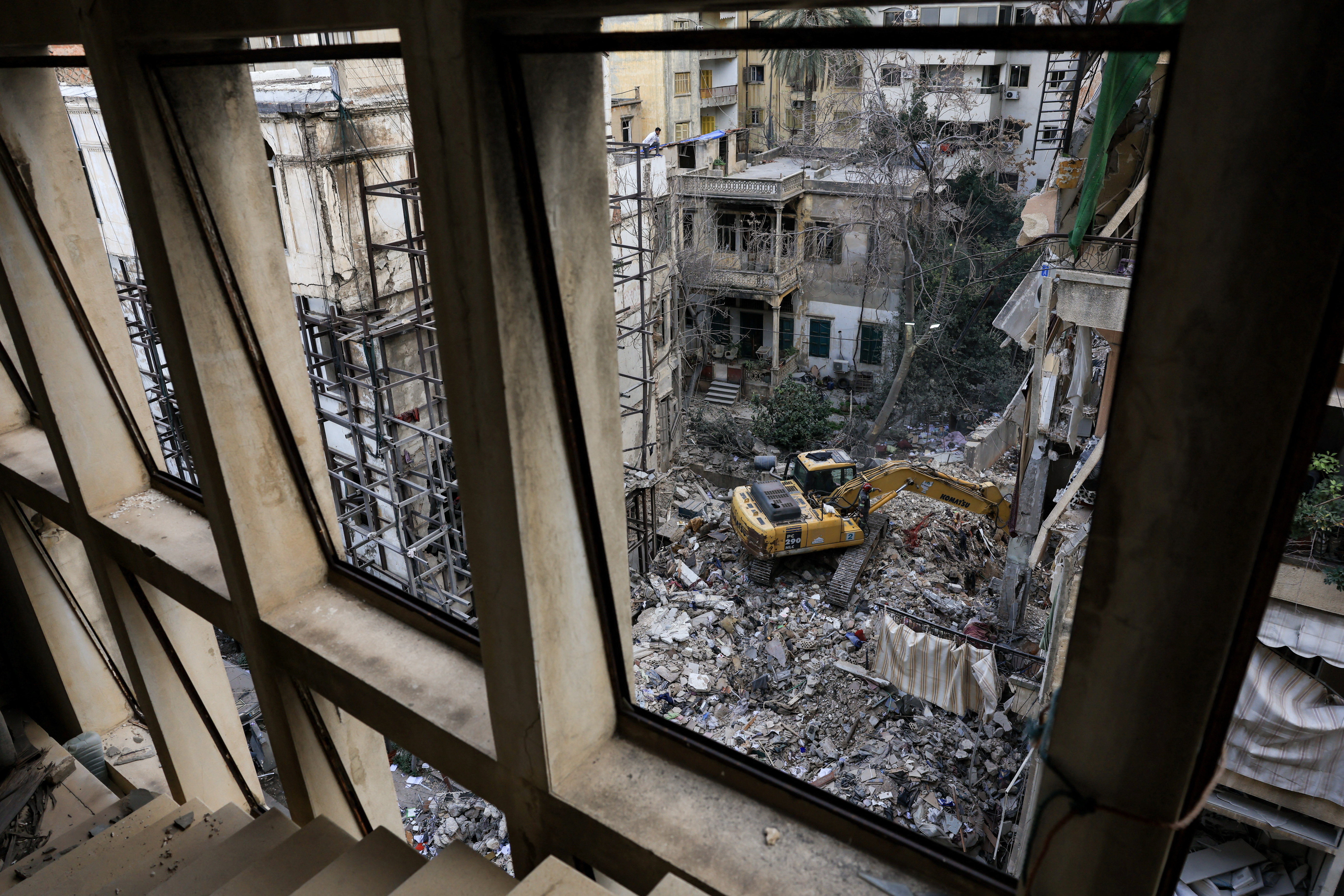 Heavy machinery operates at the site of an Israeli strike carried out on Wednesday, in Ain Al Mraiseh in Beirut
