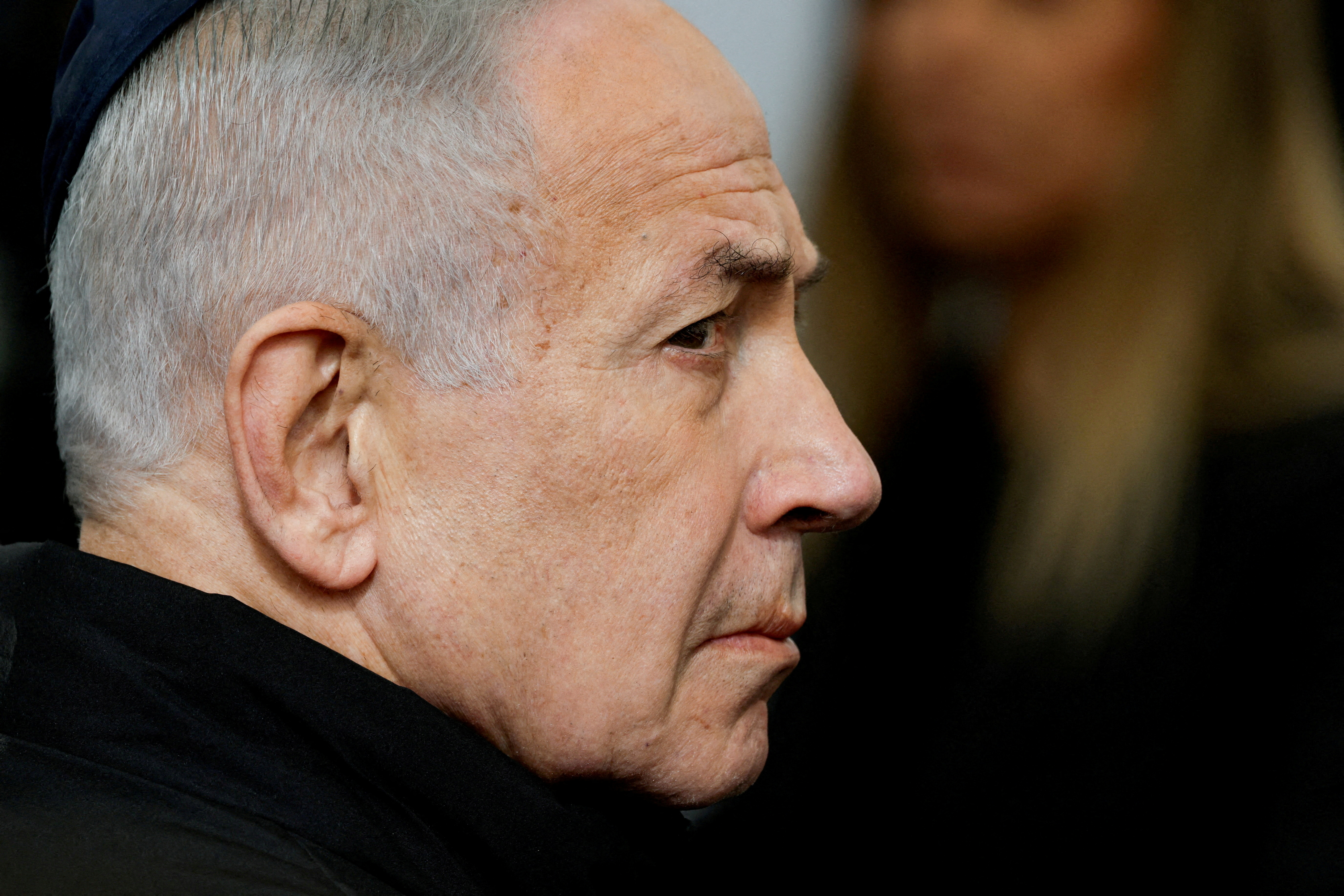 FILE PHOTO: Israeli Prime Minister Benjamin Netanyahu attends a memorial service held for Ran Gvili, an off-duty police officer who was killed fighting militants that had infiltrated Israel during the deadly October 7, 2023, attack by Hamas, and the last hostage recovered from Gaza, in Meitar, Israel, January 28, 2026. REUTERS/Amir Cohen/File Photo