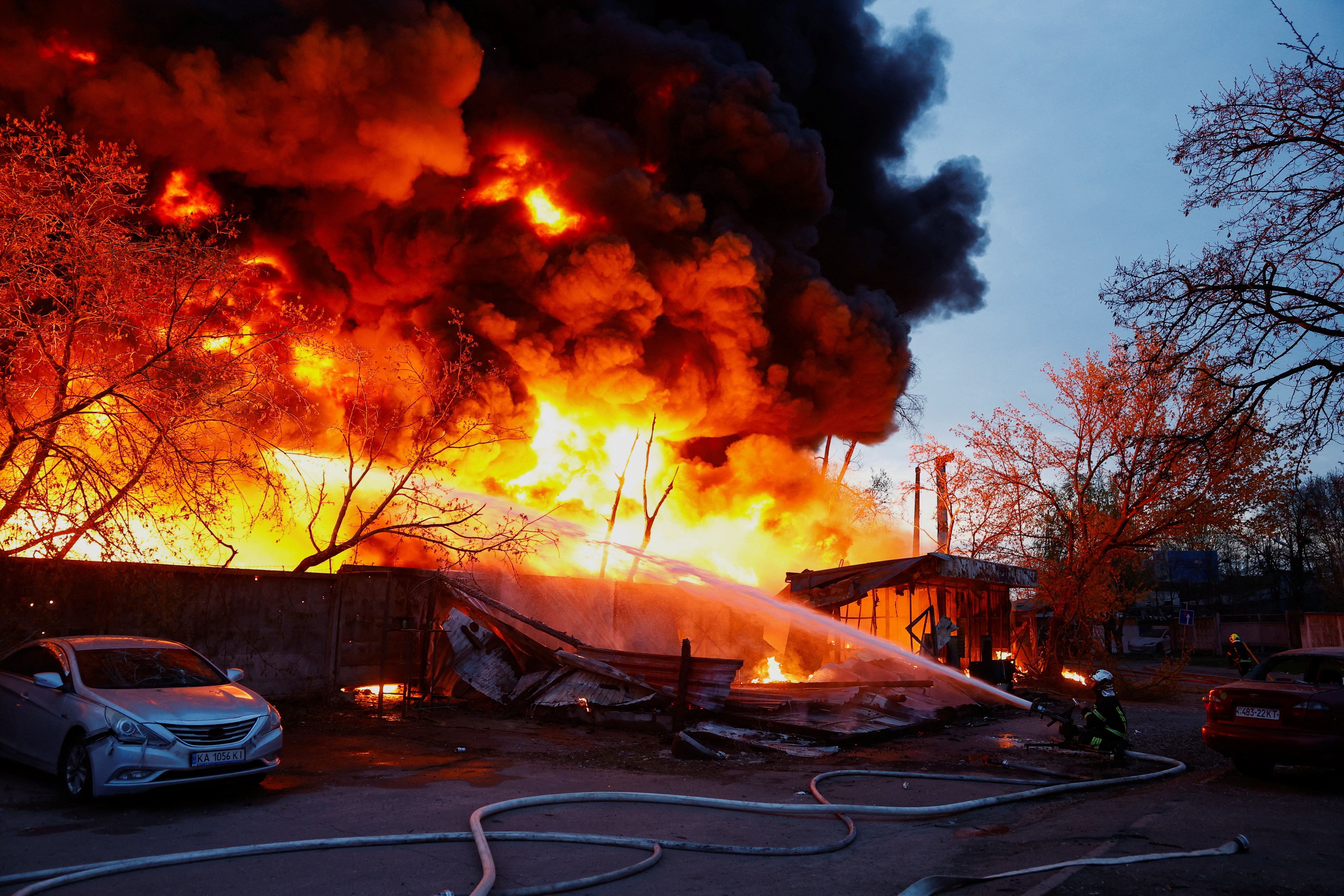 Firefighters work to put out a huge fire.