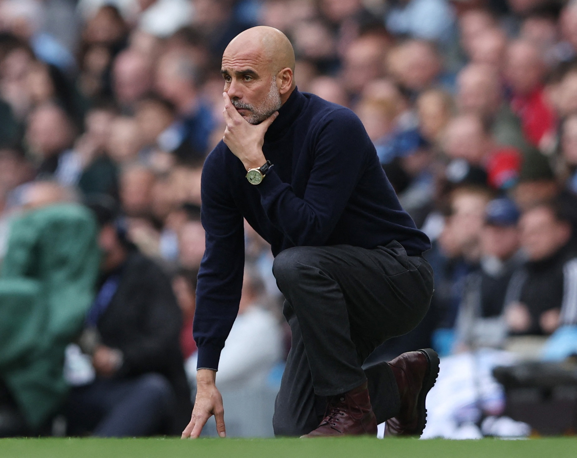 Manchester City manager Pep Guardiola reacts during a game.