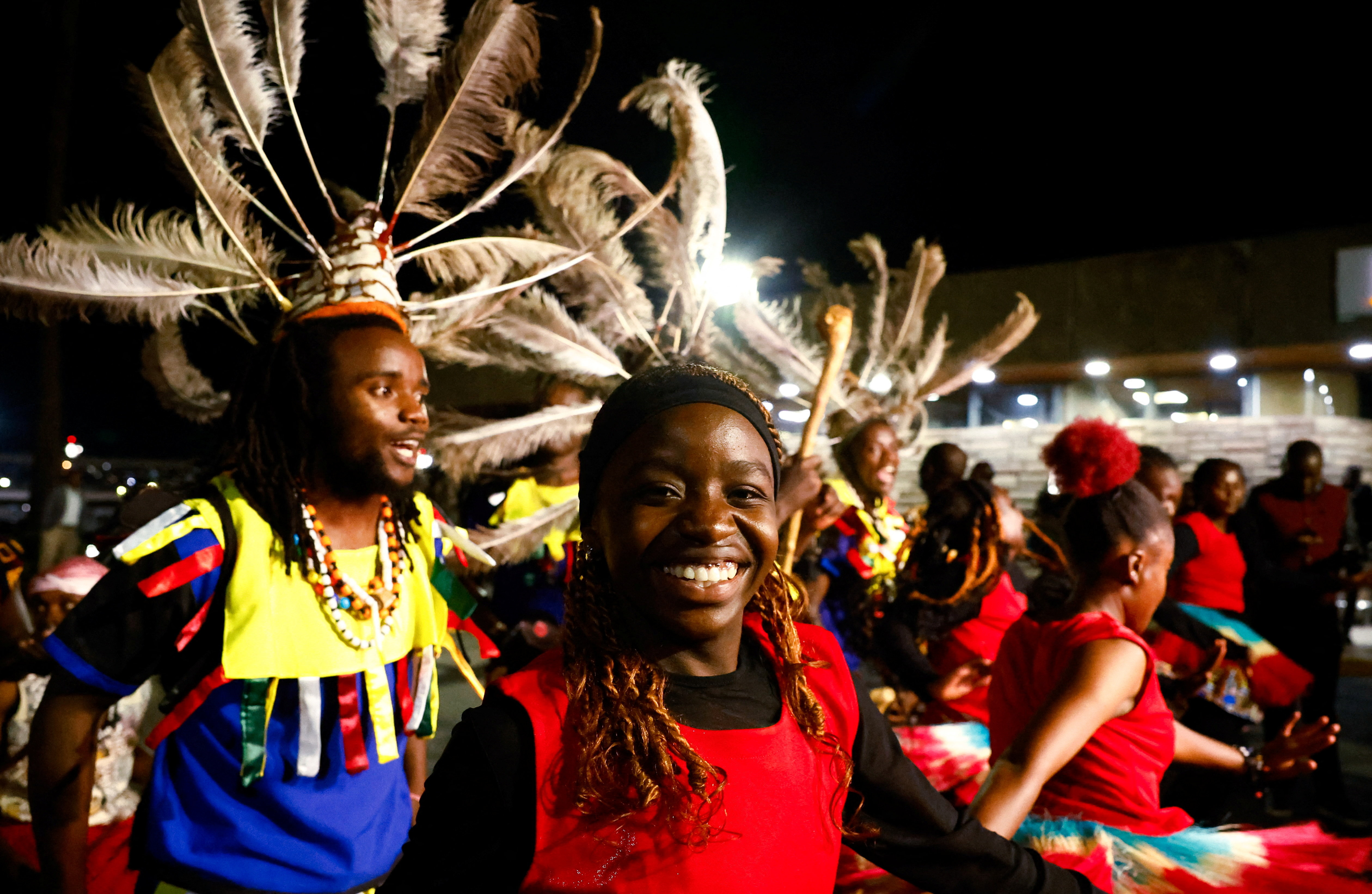 Traditional entertainers perform to welcome Kenyan runner Sabastian Sawe (not pictured) as he arrives at Jomo Kenyatta International Airport after breaking the men's marathon world record at the 2026 London Marathon to become the first person to run a marathon in under two hours in an official race, setting a new world record with a time of 1:59:30, in Nairobi, Kenya, April 29, 2026. REUTERS/Monicah Mwangi
