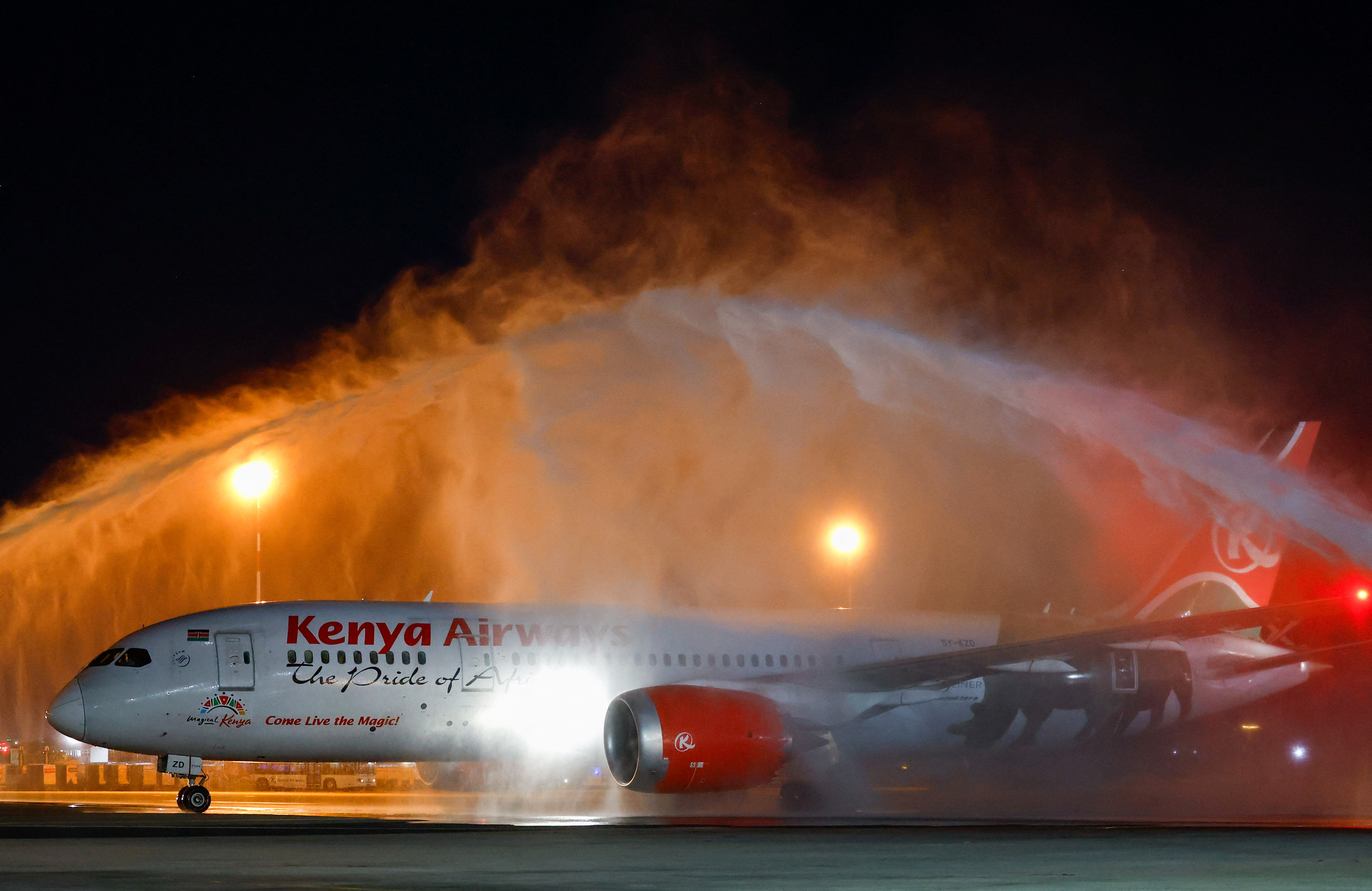 A Kenya Airways plane receives a water cannon salute as it arrives with Kenyan runner Sebastian Sawe at Jomo Kenyatta International Airport after breaking the men's marathon world record at the 2026 London Marathon to become the first person to run a marathon in under two hours in an official race, setting a new world record with a time of 1:59:30, in Nairobi, Kenya, April 29, 2026. REUTERS/Thomas Mukoya