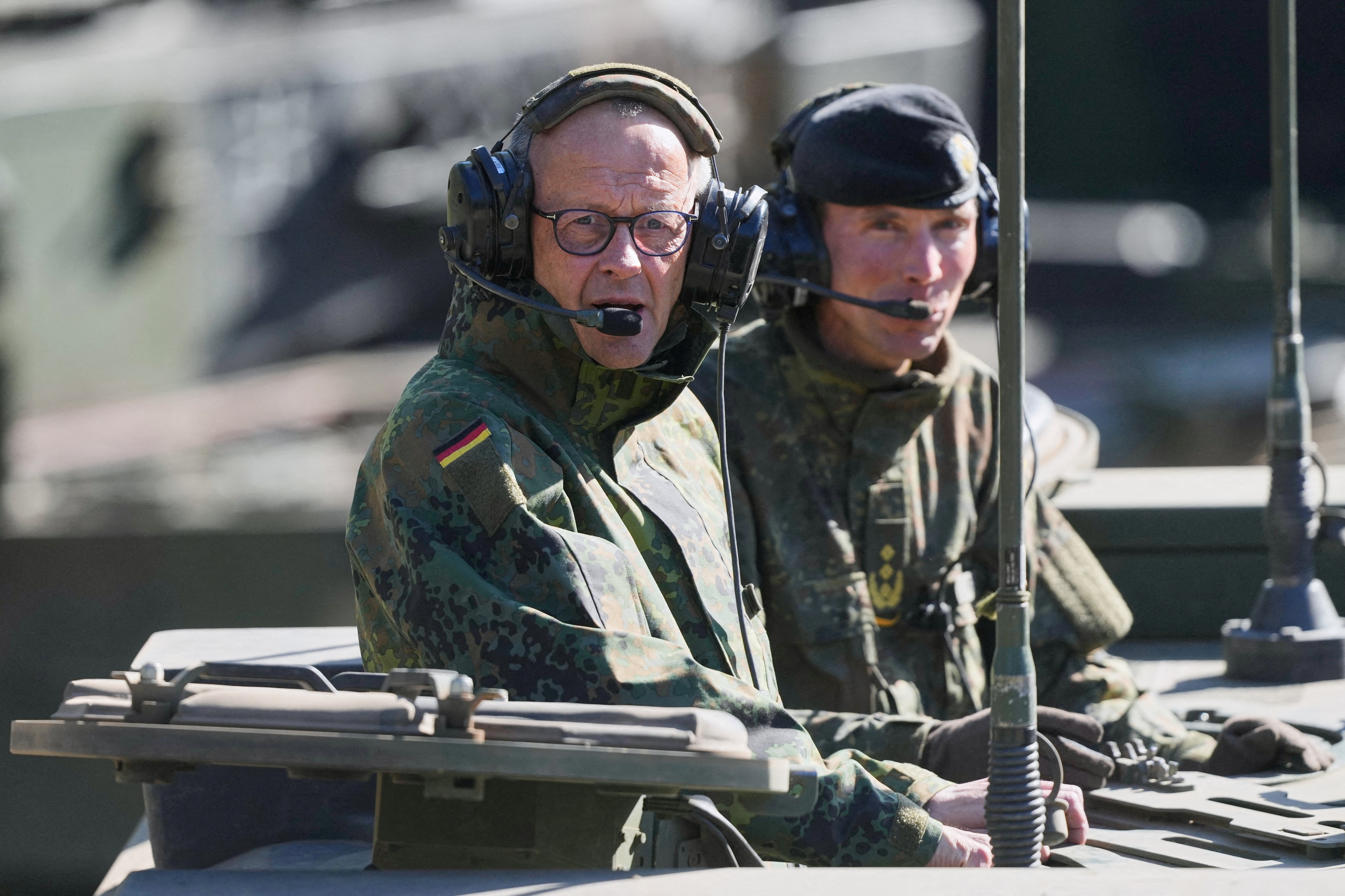 Merz in military gear