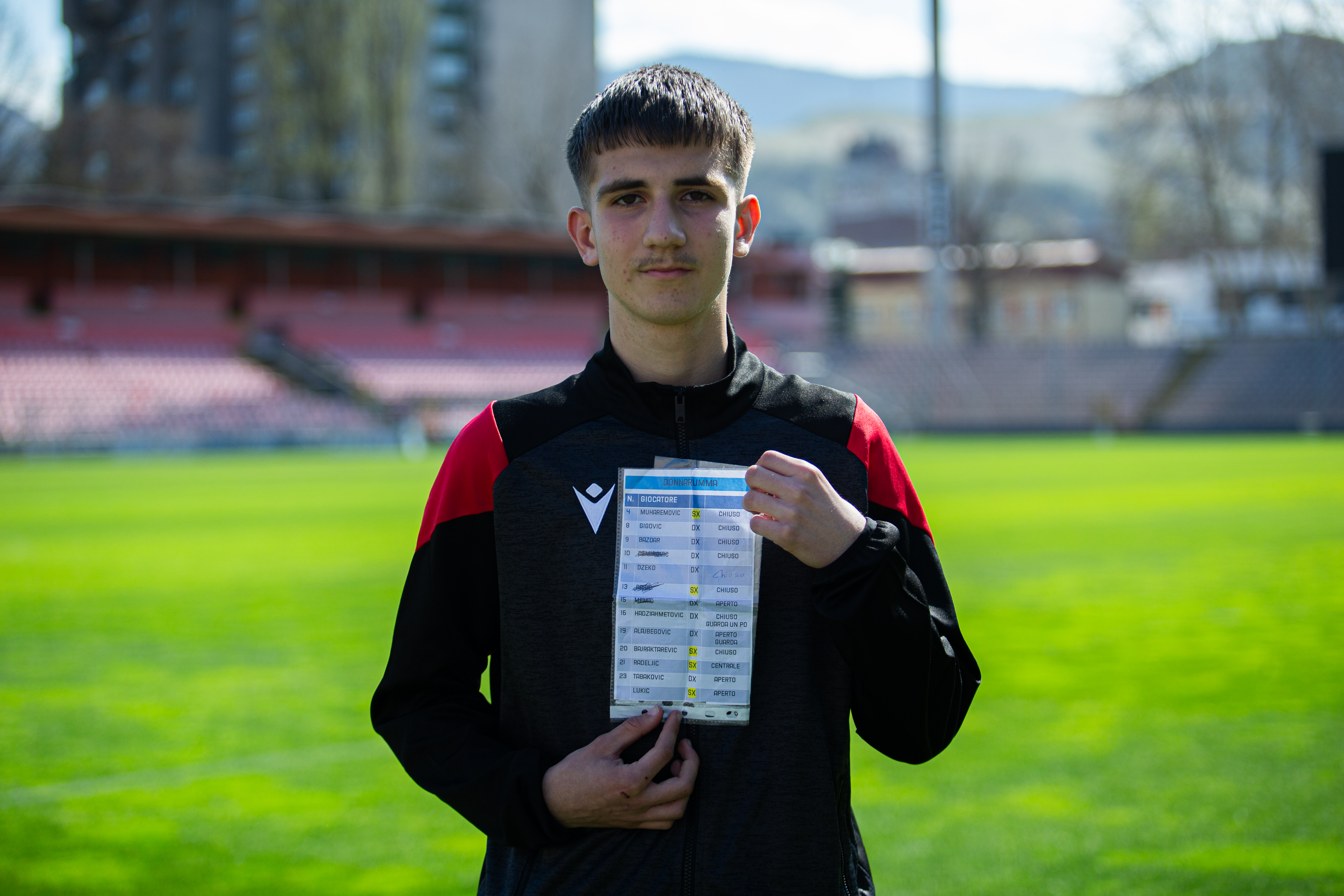 Afan Cizmic, a 14-year-old ball boy and youth player of NK Celik who gained global attention after taking a note from Italy goalkeeper Gianluigi Donnarumma listing Bosnian penalty takers during a World Cup playoff final, poses with the notes in Zenica, Bosnia and Herzegovina