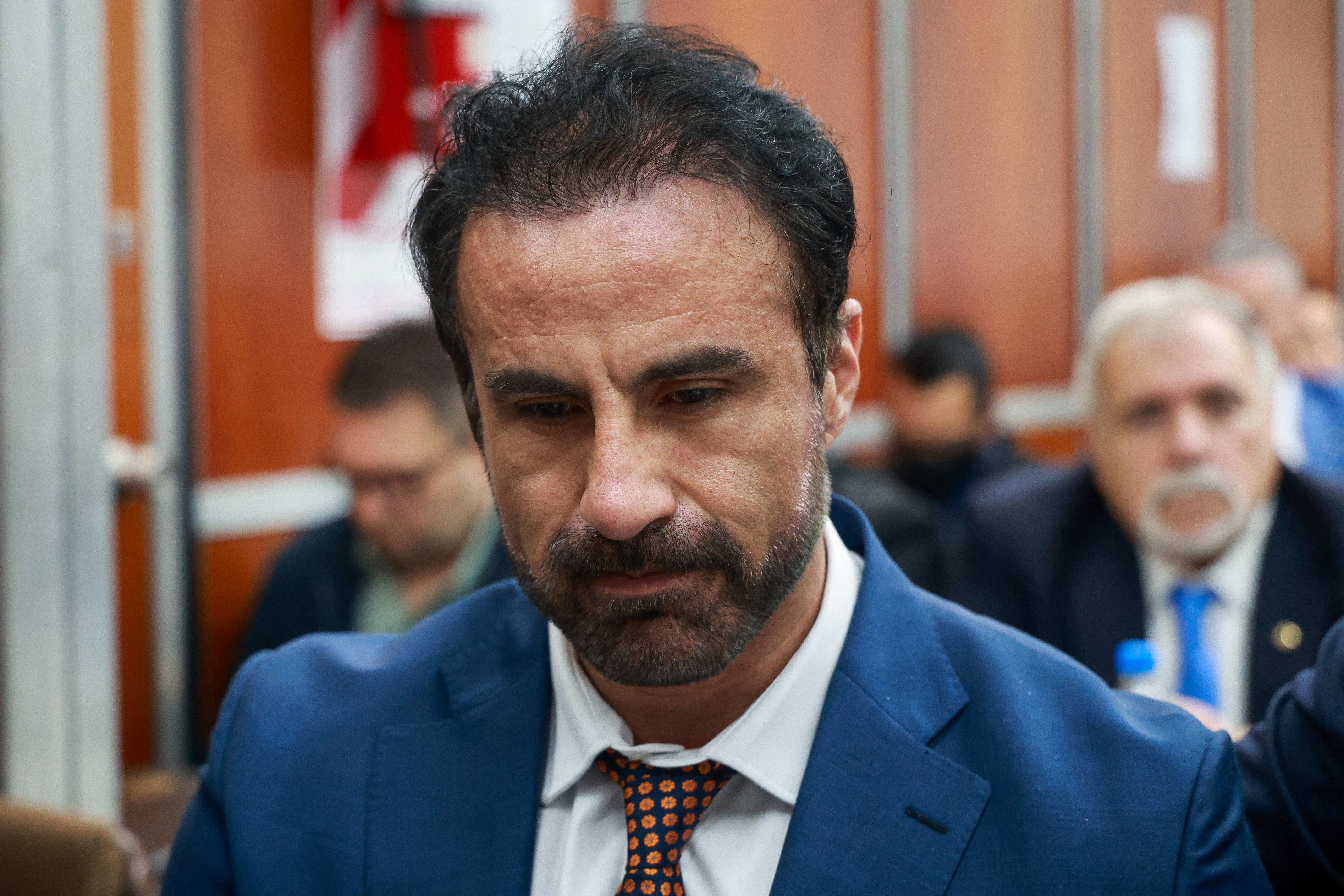Argentine football legend Diego Maradona's former medical doctor Leopoldo Luque is seen at a courthouse for a preliminary hearing in a trial over his death in San Isidro, outskirts of Buenos Aires on April 14, 2026. (Photo by Tomas CUESTA / AFP)