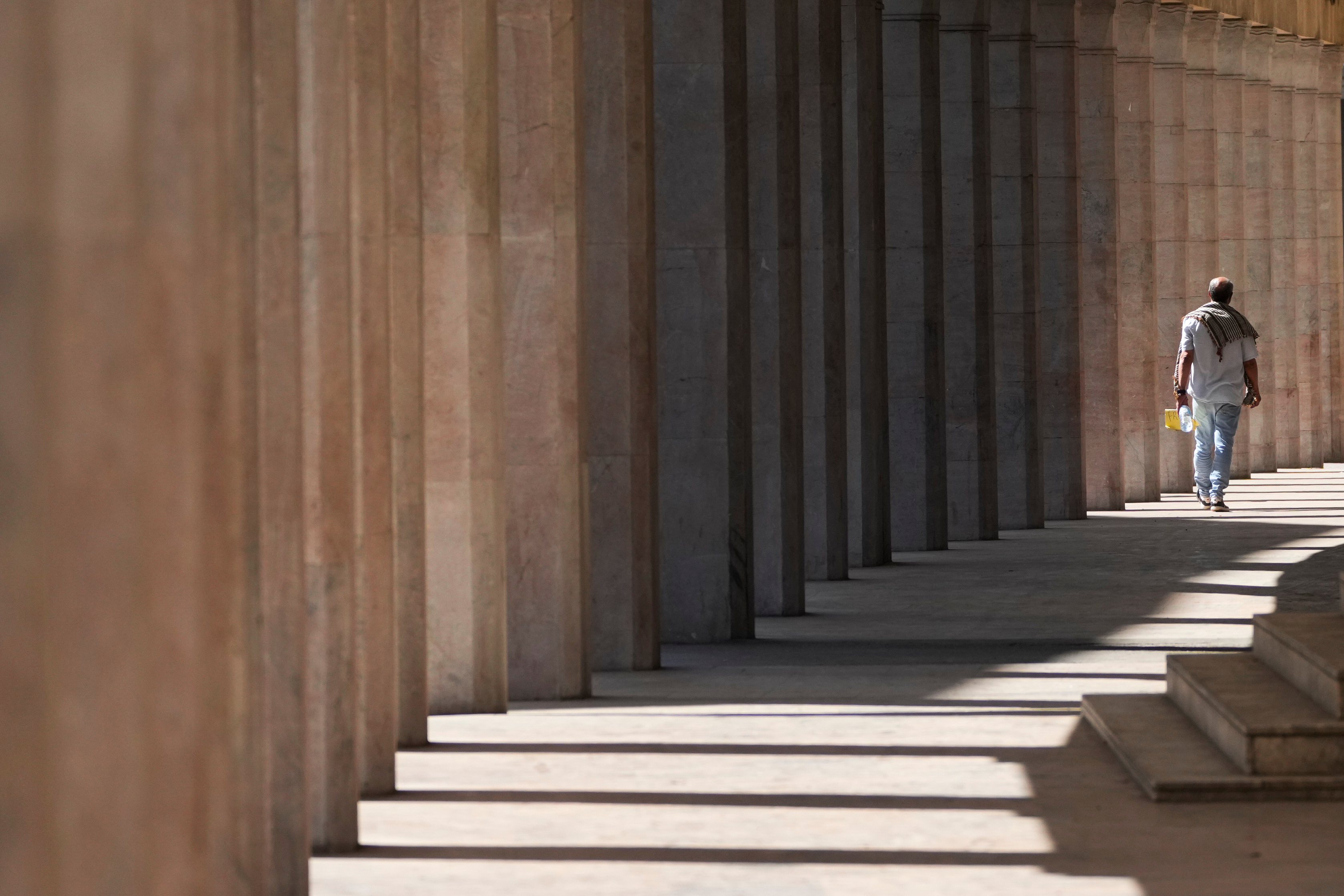 A man walks through a passage in Rabat, Morocco