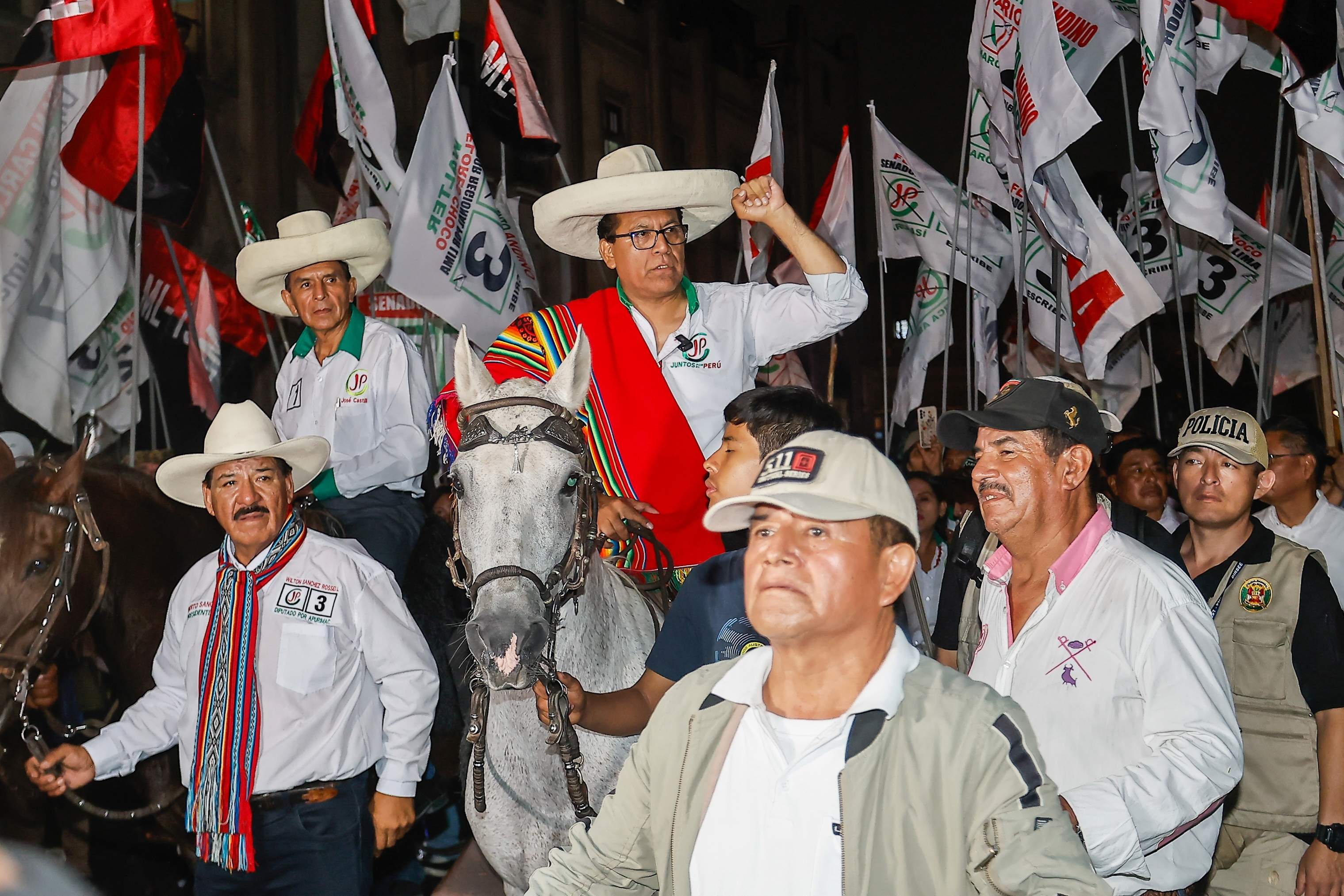 Presidential candidate Roberto Sanchez of Together for Peru party arrives to his closing campaign rally on a horse in Lima, Peru, Wednesday, April 8, 2026. (AP Photo/Bruno Elias)