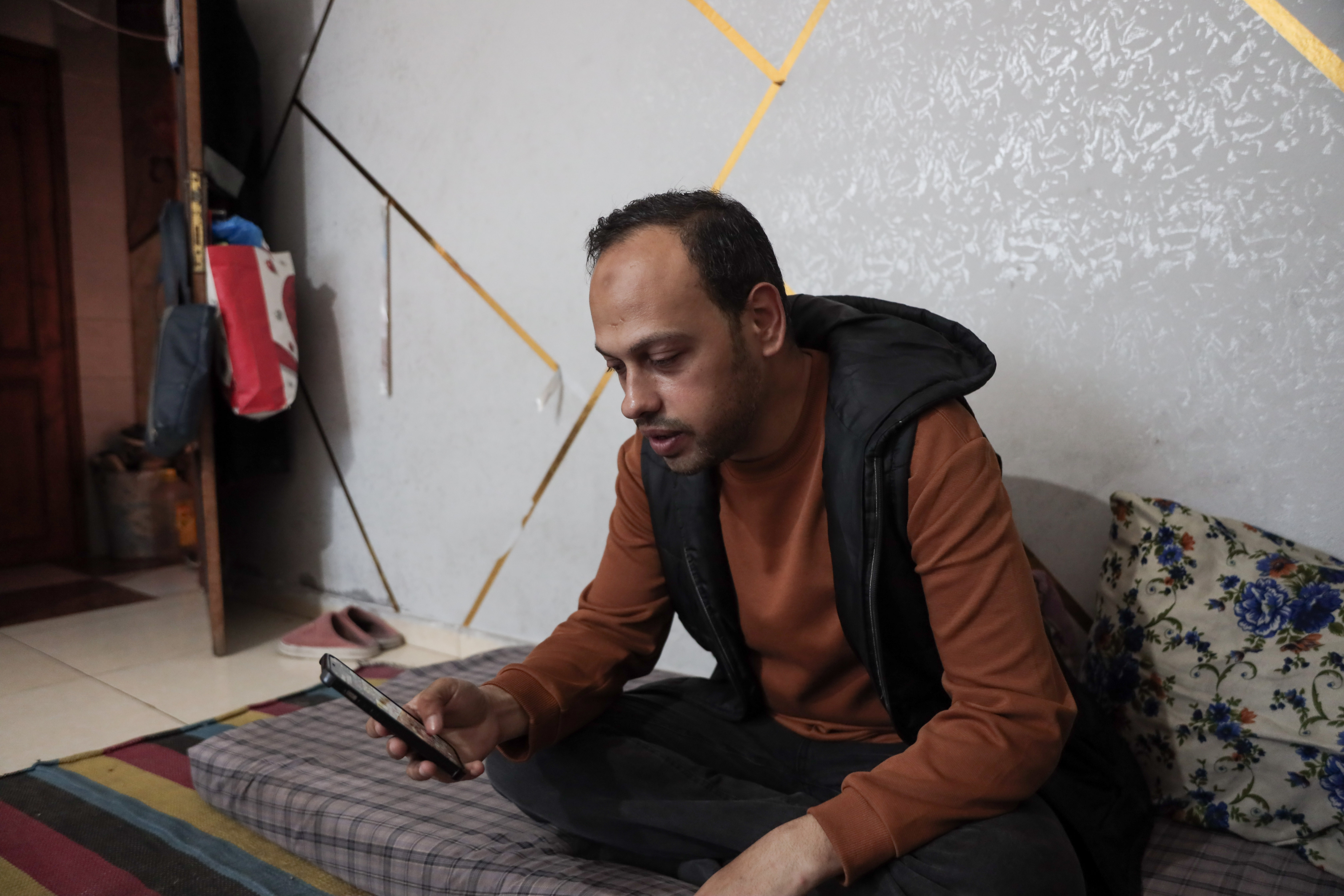 Mohammed Lubbad at his home in Deir Al Balah central the Gaza Strip [Abdelhakim Abu Riash/ Al Jazeera]