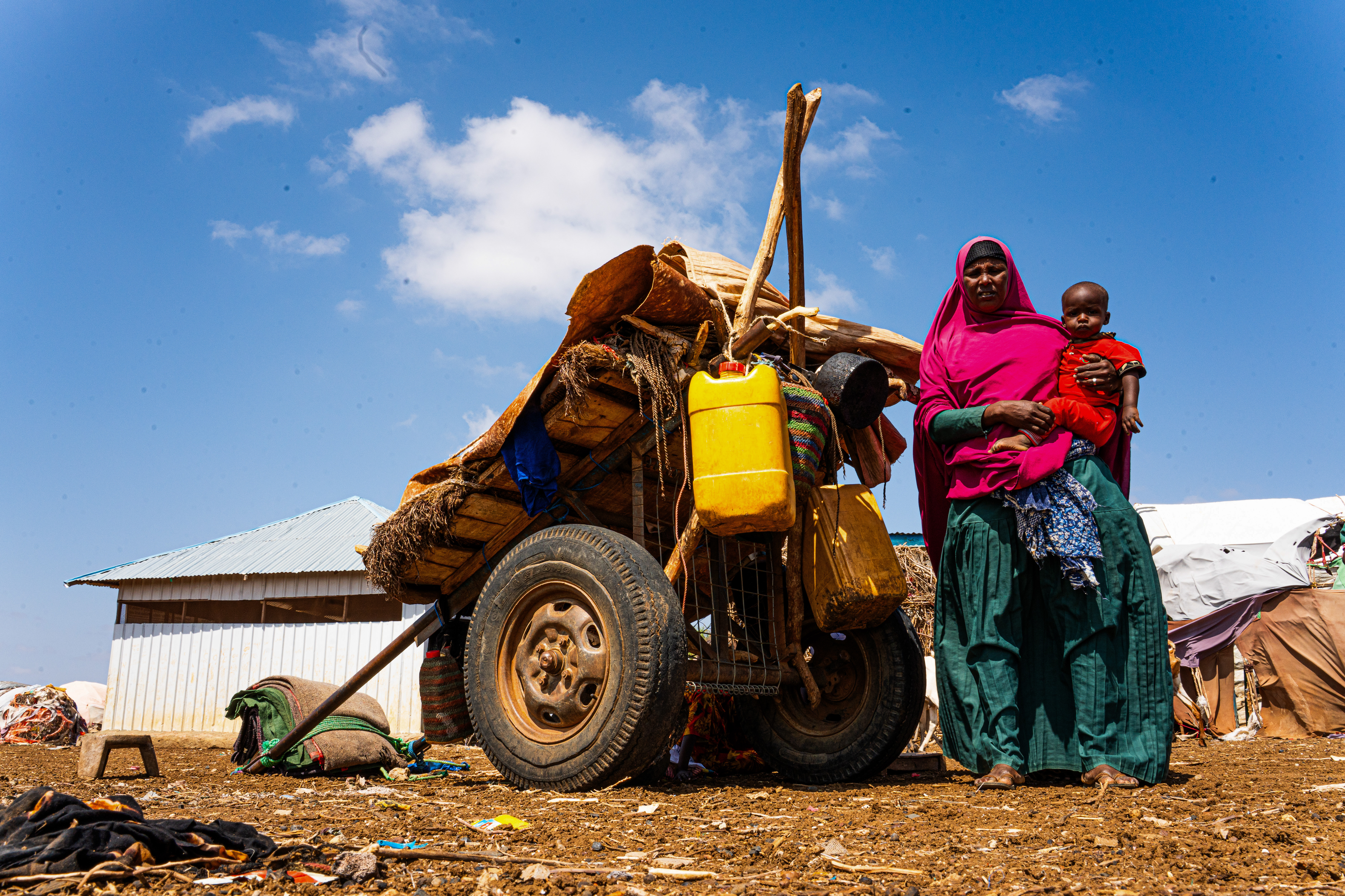 Fatima Adan, 49, is one of the newly arrived families at Qaydar-adde camp. When the rains failed and her animals began to die in the Bakool region, she and her family loaded what they could onto a donkey cart and spent days on the road with little food or water before finally reaching Baidoa. At the camp, access to food, safe water, and healthcare remains critically limited. Humanitarian assistance has been scarce as funding continues to fall short of the $852 million requested for Somalia in 2026 (OCHA). Qaydar-adde displacement camp, Baidoa, Southwest State, Somalia. [Abdulkadir Mohamed/NRC]