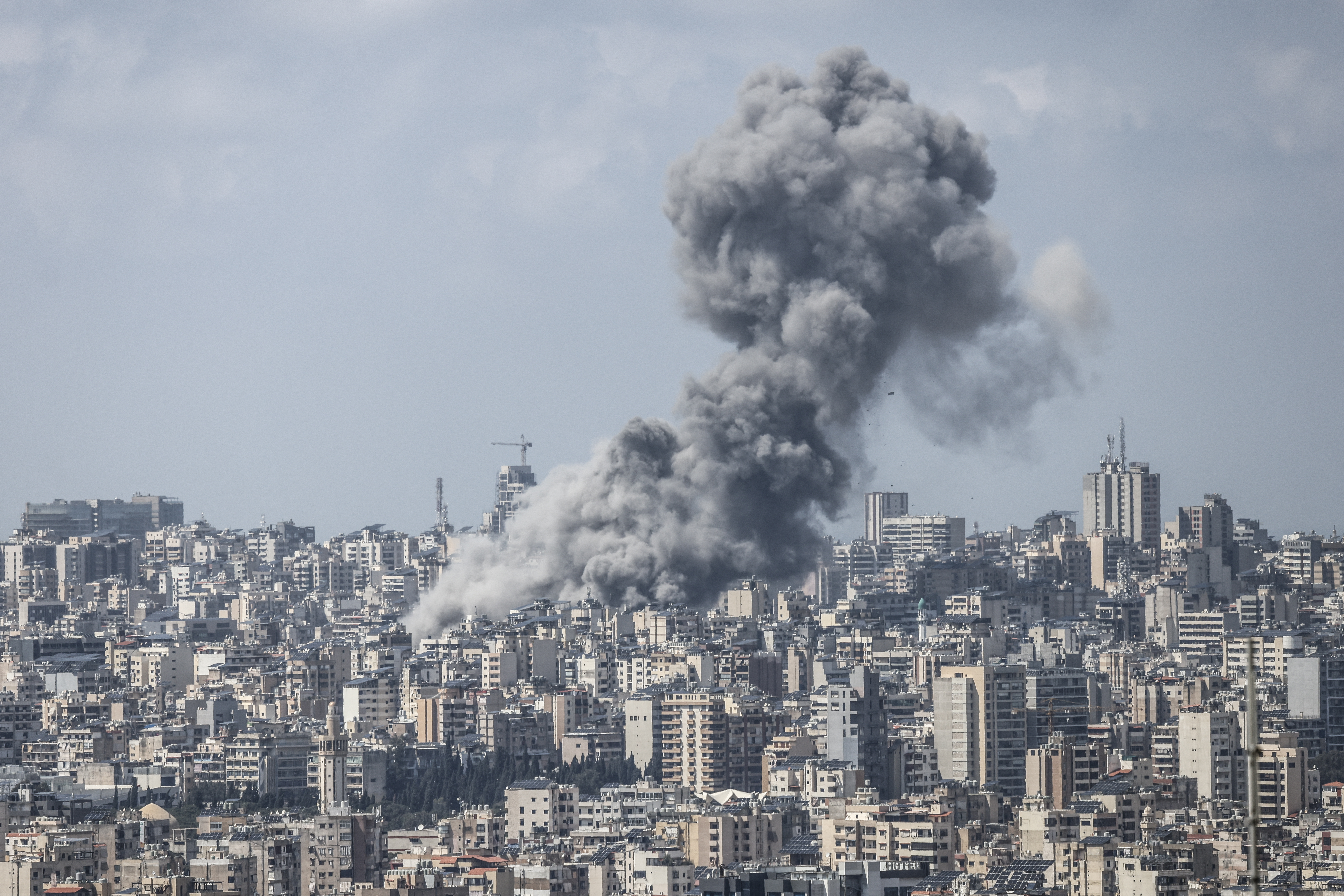 Smoke rises following Israeli airstrikes over Beirut and its southern suburbs on April 8, 2026.