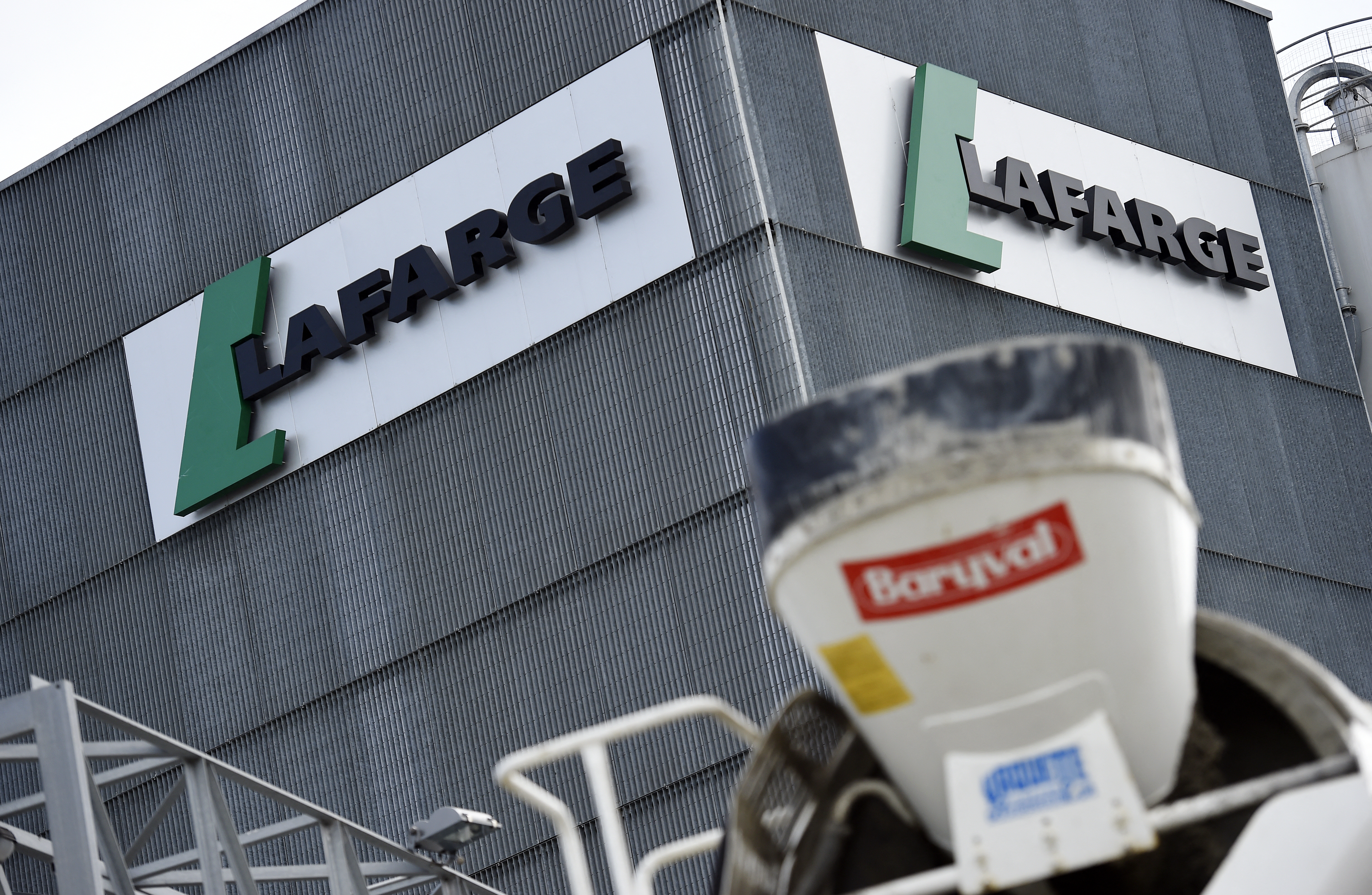 A picture shows the logo on a plant of French cement company Lafarge on April 7, 2014, in Paris, France