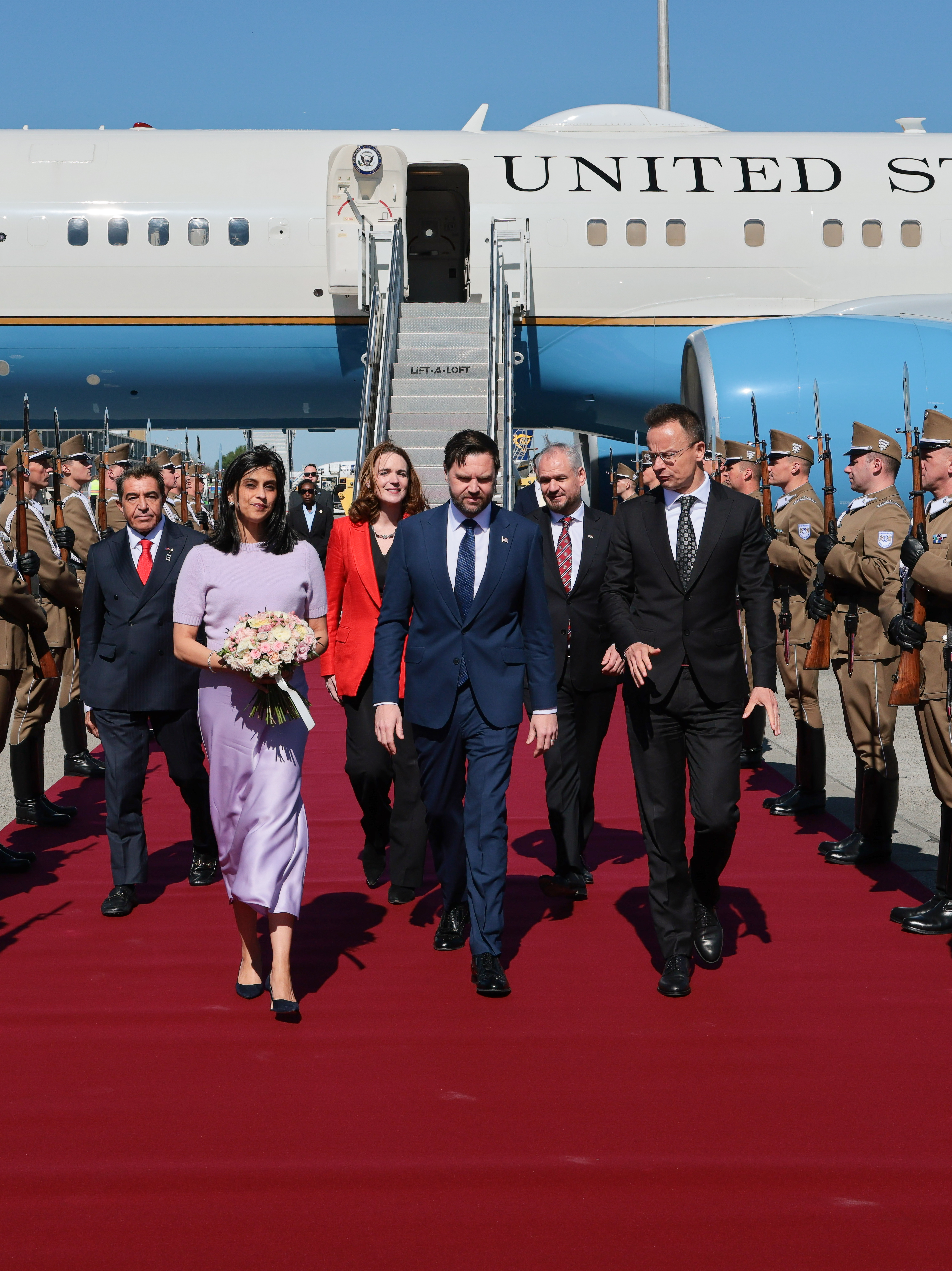 BUDAPEST, HUNGARY - APRIL 7: Hungarian Foreign Minister Peter Szijjarto welcomes U.S. Vice President JD Vance and second lady Usha Vance as they arrive at Budapest Ferenc Liszt International Airport on April 7, 2026 in Budapest, Hungary. Vance is supporting Orban's bid for reelection in Hungarian parliamentary elections scheduled for April 12. (Photo by Jonathan Ernst - Pool/Getty Images)