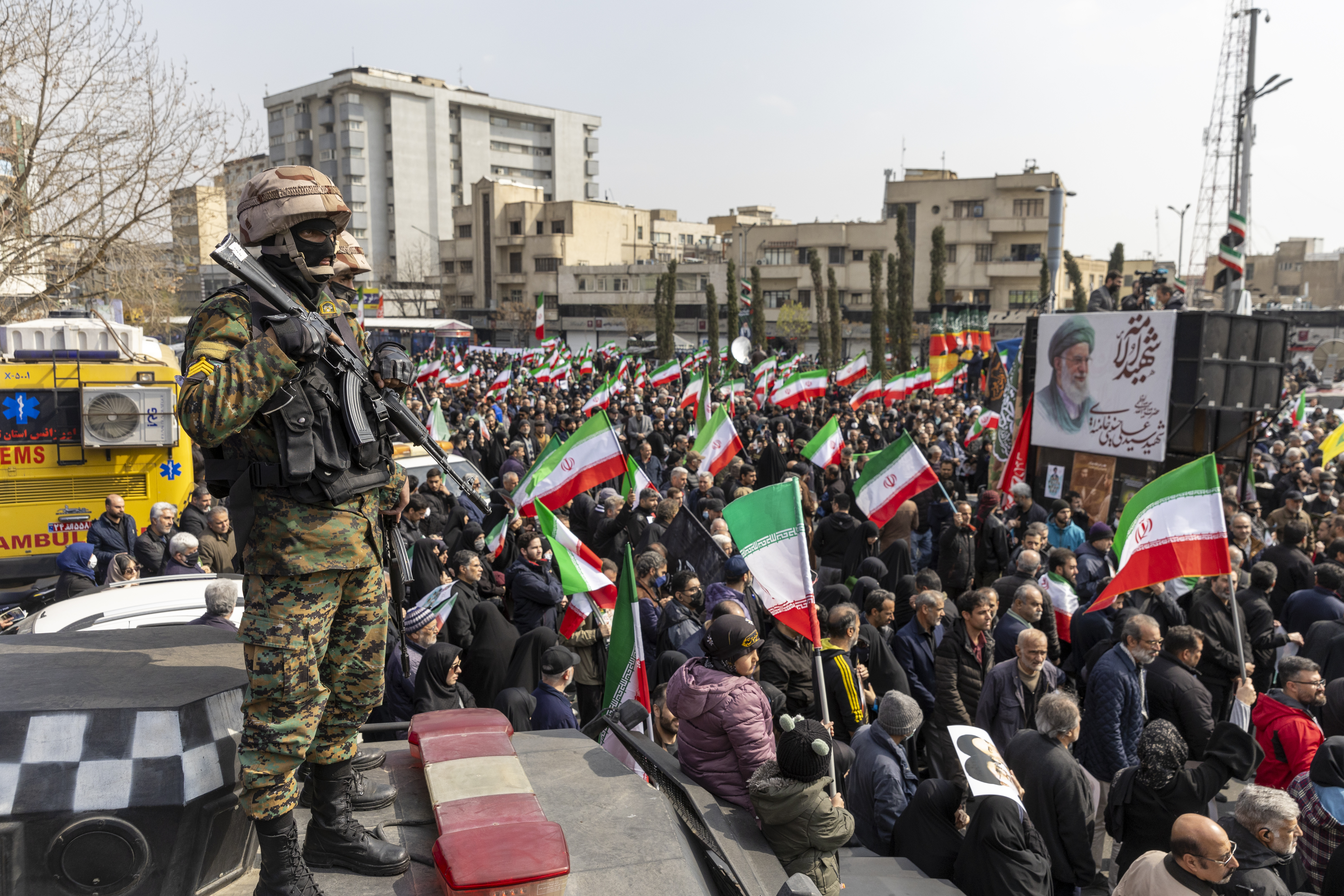 TEHRAN, IRAN - MARCH 11: Soldiers stand guard as unerals are held for members of Iran's Revolutionary Guards Corps (IRGC) and other military figures at Enghelab Square on March 11, 2026 in Tehran, Iran. The deceased were killed during the joint U.S.-Israeli strikes in Iran that began on February 28. Iran has retaliated by firing waves of missiles and drones at Israel, and targeting U.S. allies in the region. (Photo by Majid Saeedi/Getty Images)