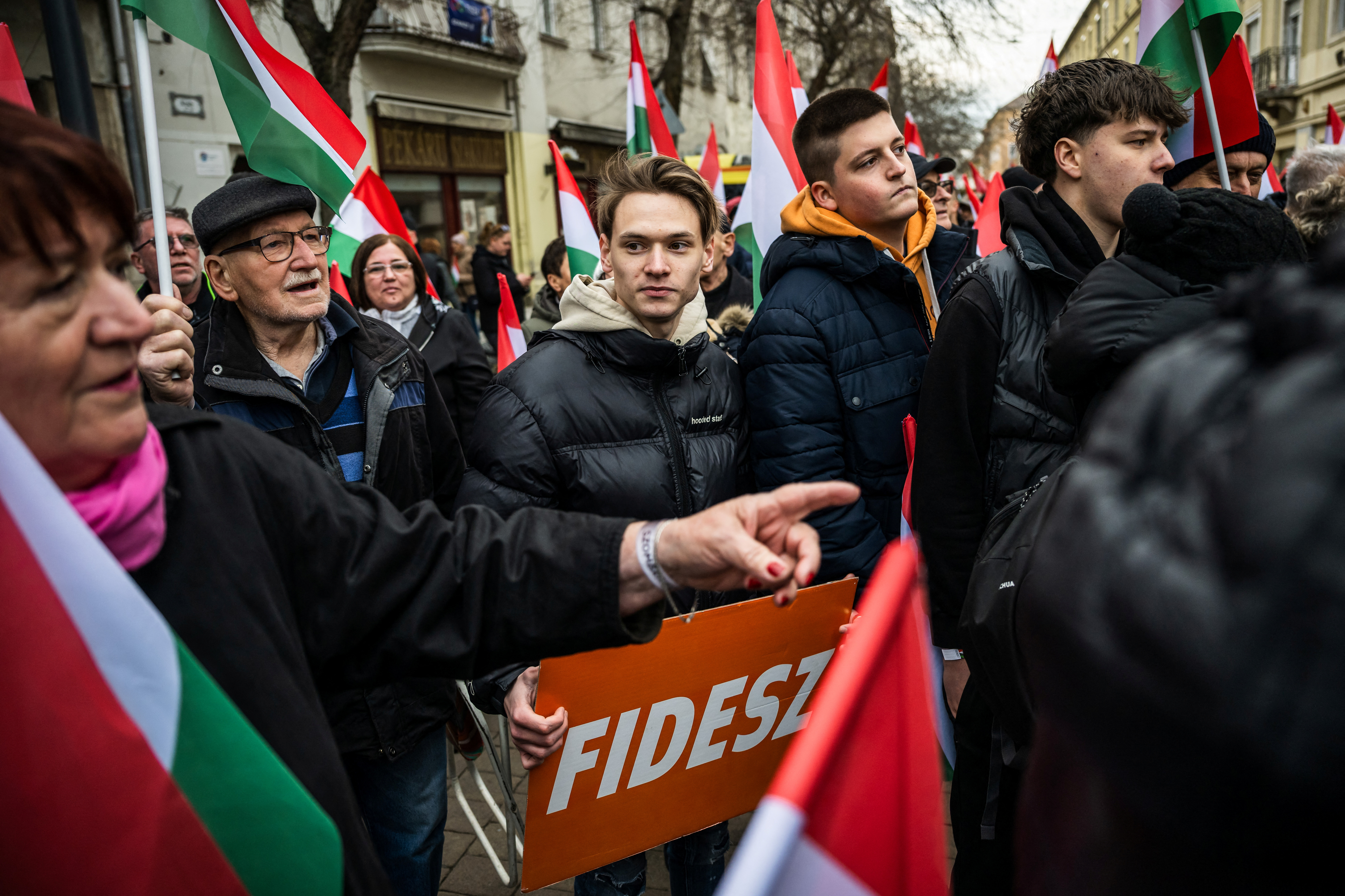 Fidesz party voter Gergo Farkas takes part in Prime Minister Viktor Orban’s election campaign rally with his friends in Szombathely, Hungary, April 2, 2026. REUTERS/Marton Monus