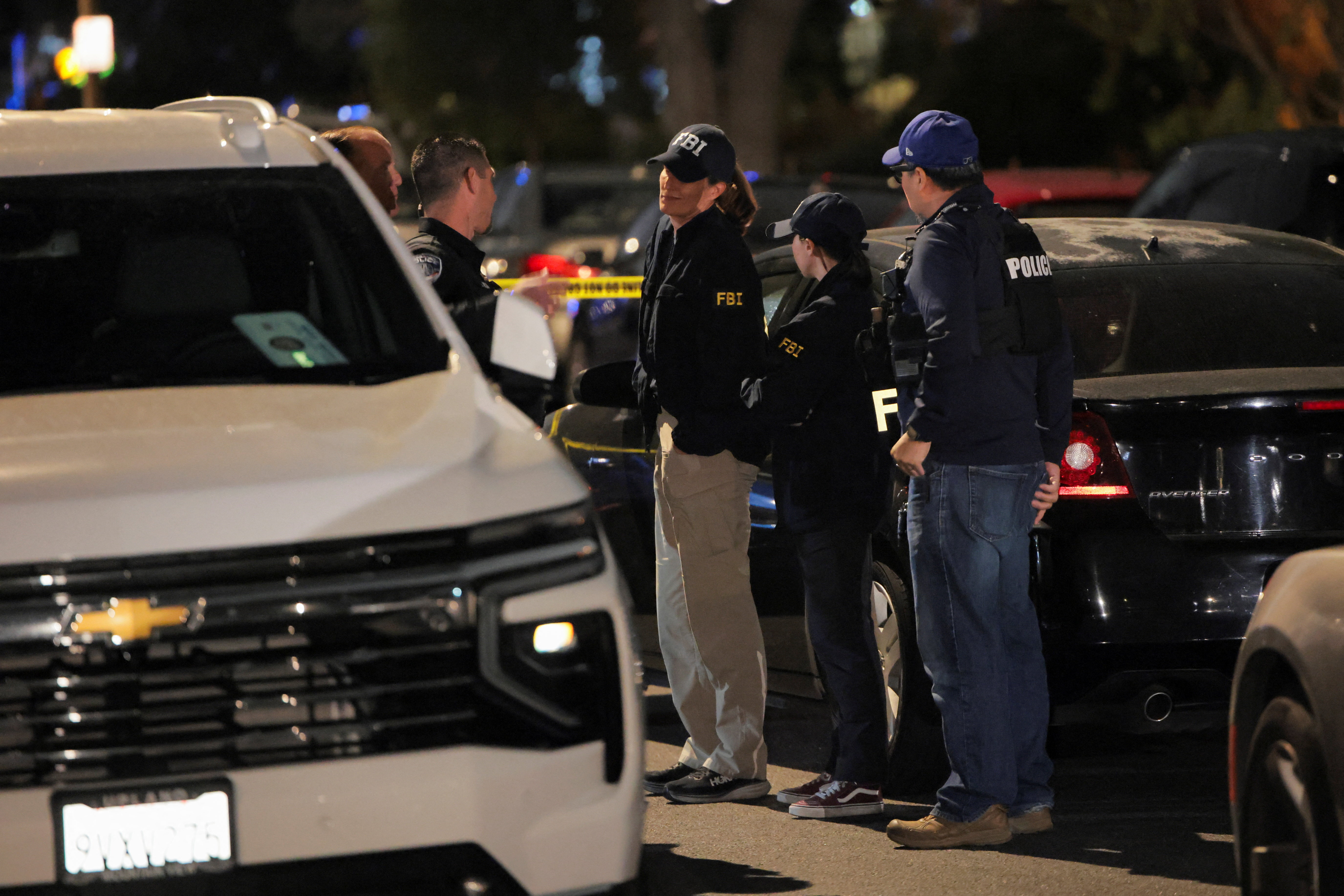 FBI agents and police officers work outside the residence associated with Cole Tomas Allen, the suspect in the shooting incident at the annual White House Correspondents' Association dinner in Washington, D.C., in Torrance, California, U.S., April 25, 2026. REUTERS/Daniel Cole
