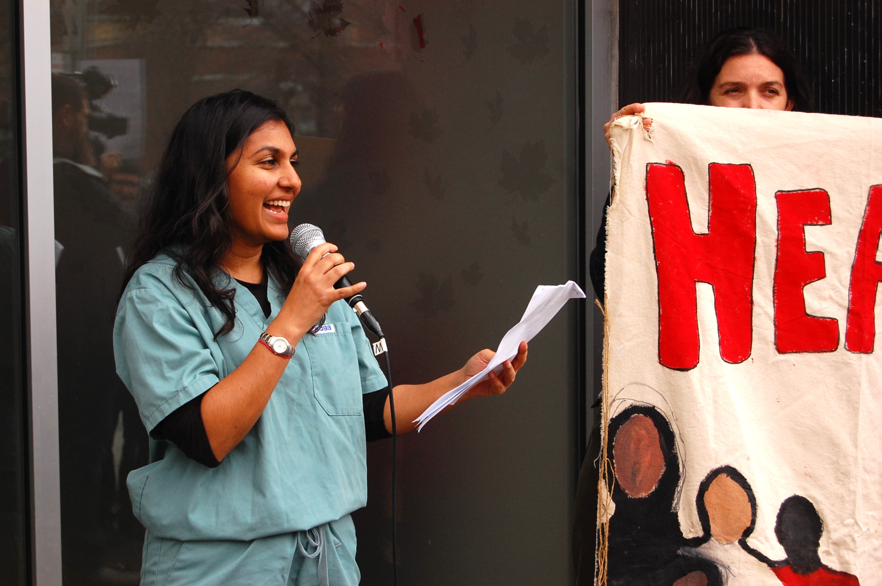 Toronto-based family doctor Ritika Goel speaks during the rally in Toronto, Canada, on April 14, 2026