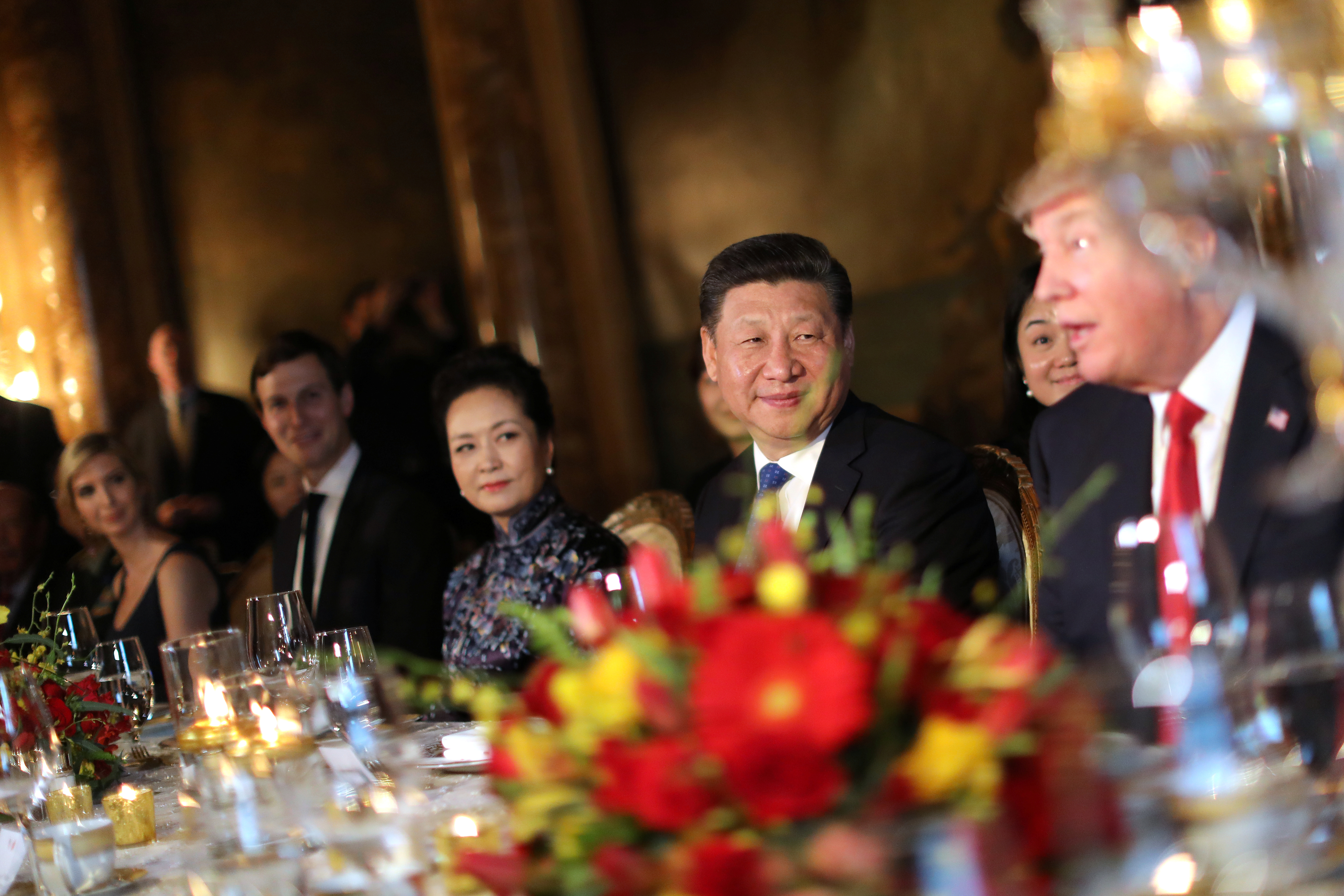 Chinese President Xi Jinping and First Lady Peng Liyuan attend a dinner hosted by U.S. President Donald Trump at Trump's Mar-a-Lago estate in West Palm Beach, Florida, U.S., April 6, 2017. REUTERS/Carlos Barria