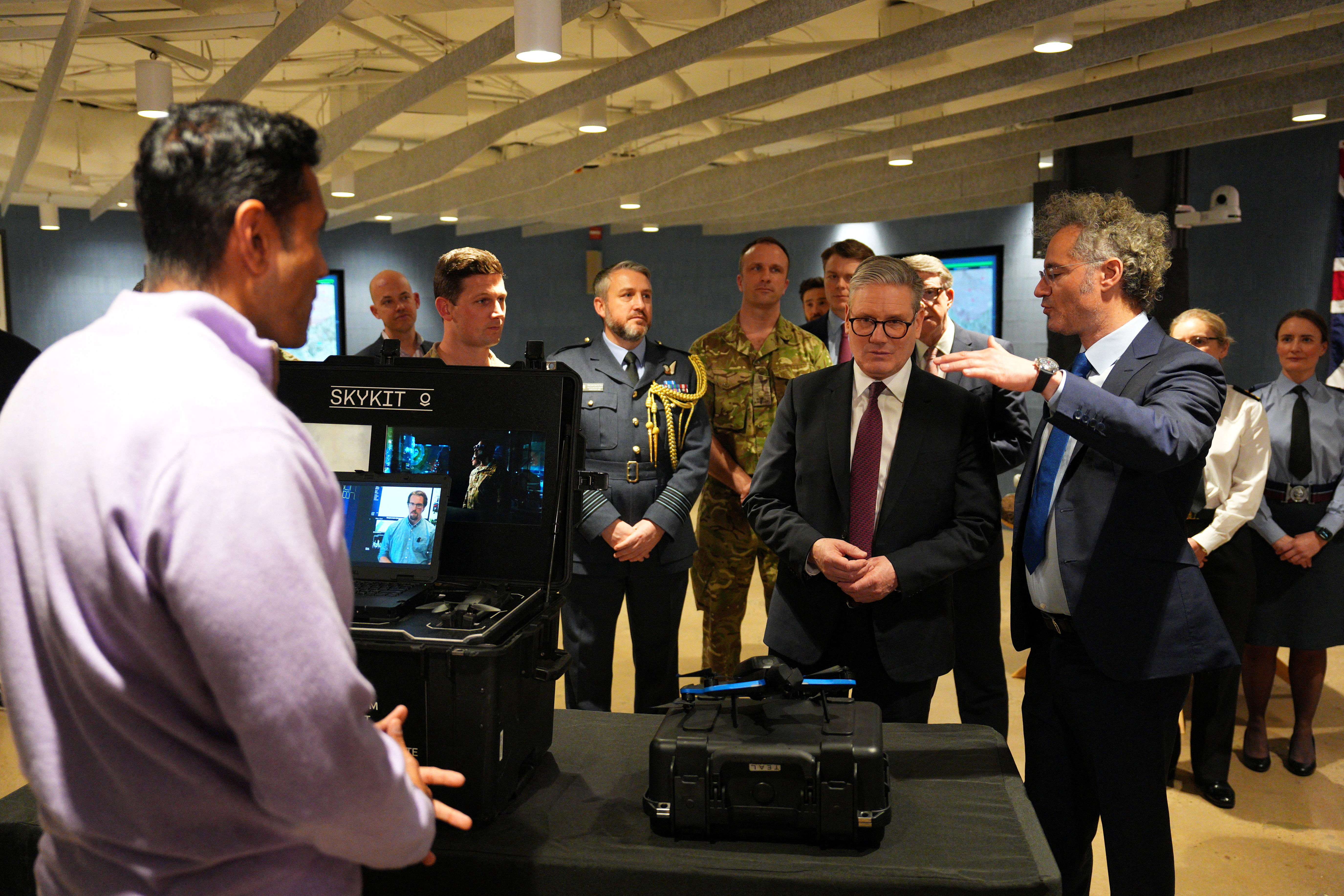 UK Prime Minister Keir Starmer and Palantir Technologies CEO Alex Karp tour Palantir headquarters in Washington, DC, U.S. on February 27, 2025. Carl Court/Pool via REUTERS