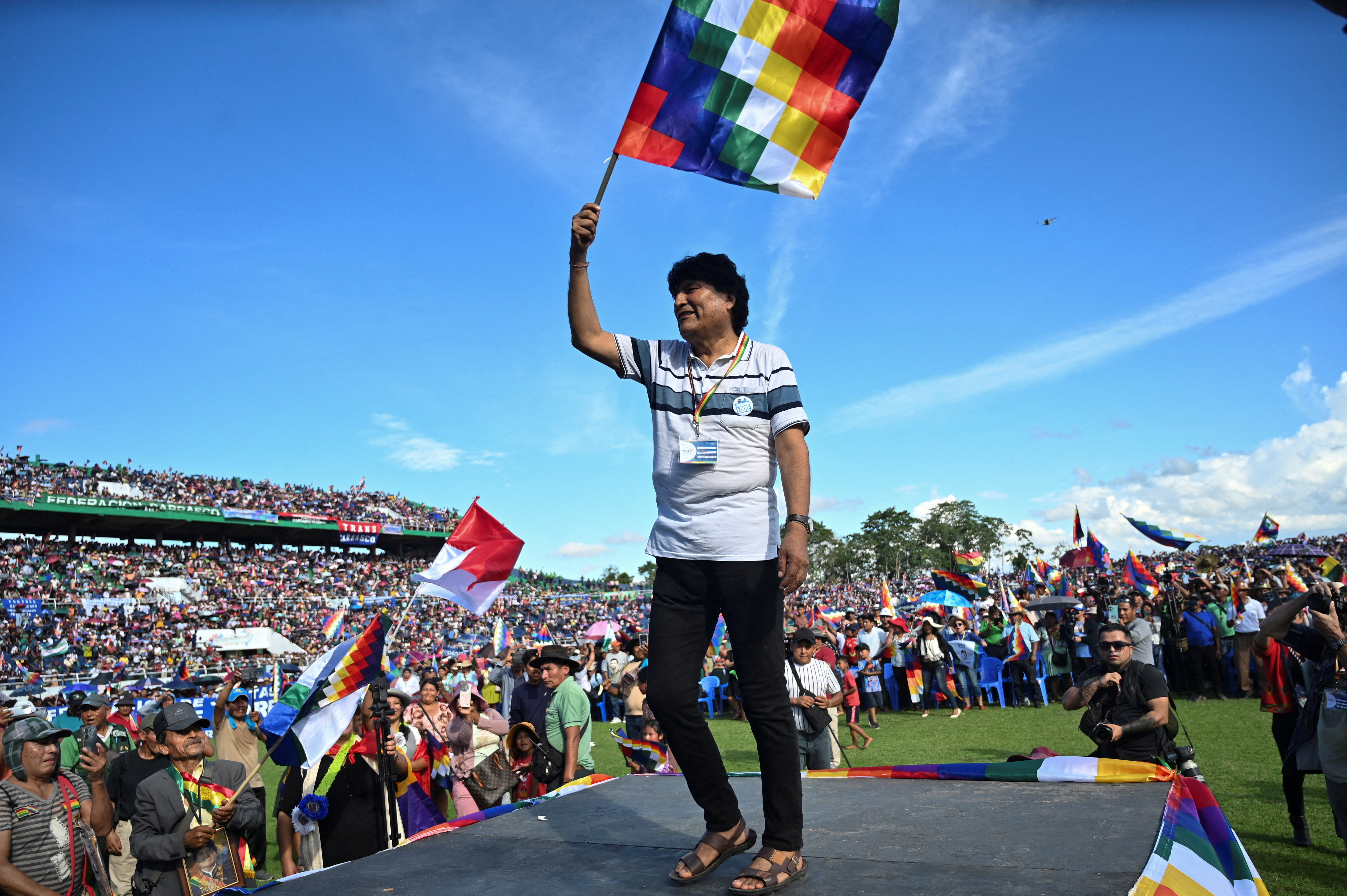 Bolivia’s former President Evo Morales waves a Wiphala flag during the closing ceremony of a RUNASUR event, an international alliance of indigenous and leftist groups, in Ivirgarzama, El Chapare, Bolivia, August 3, 2025.