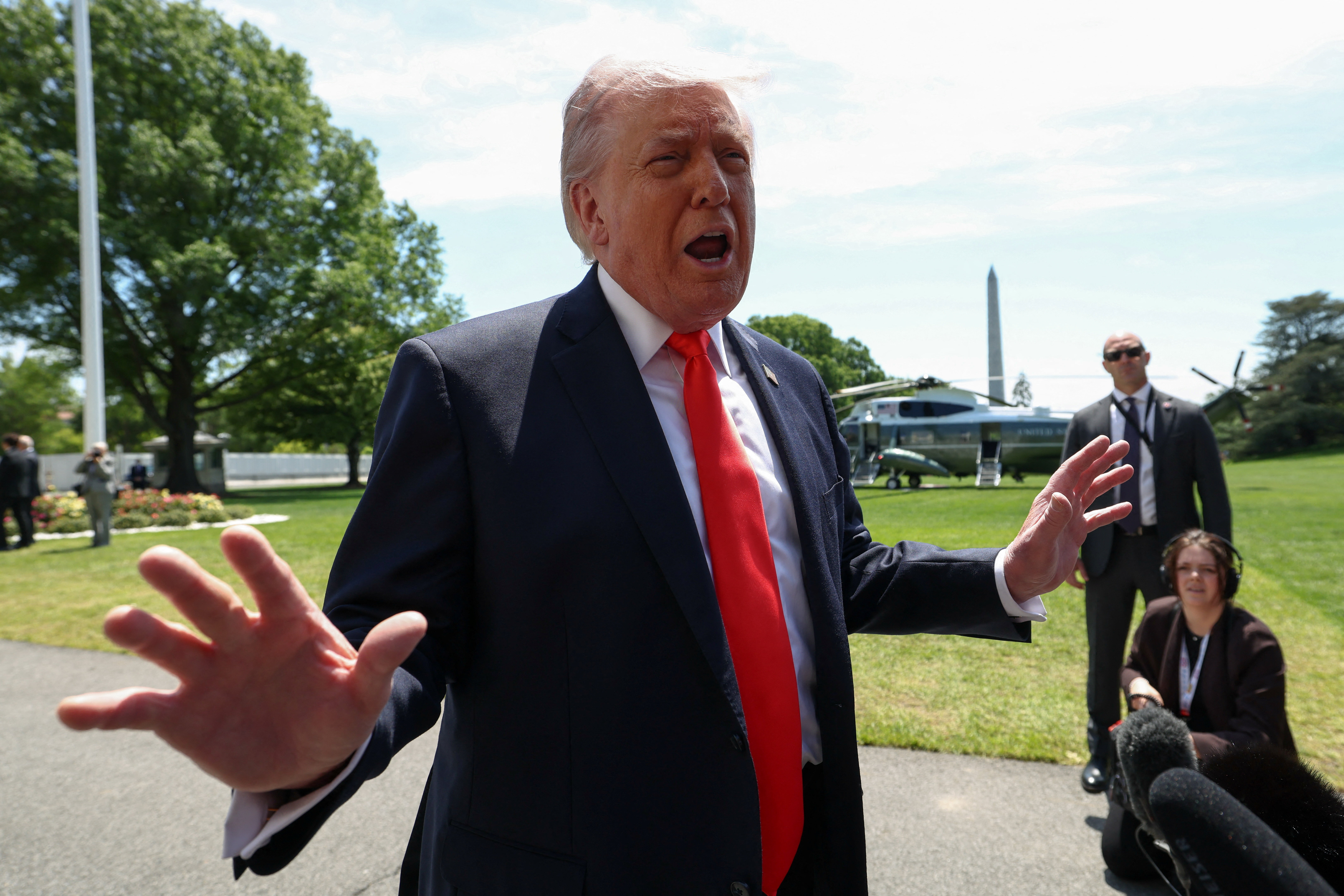 US President Donald Trump speaks to reporters