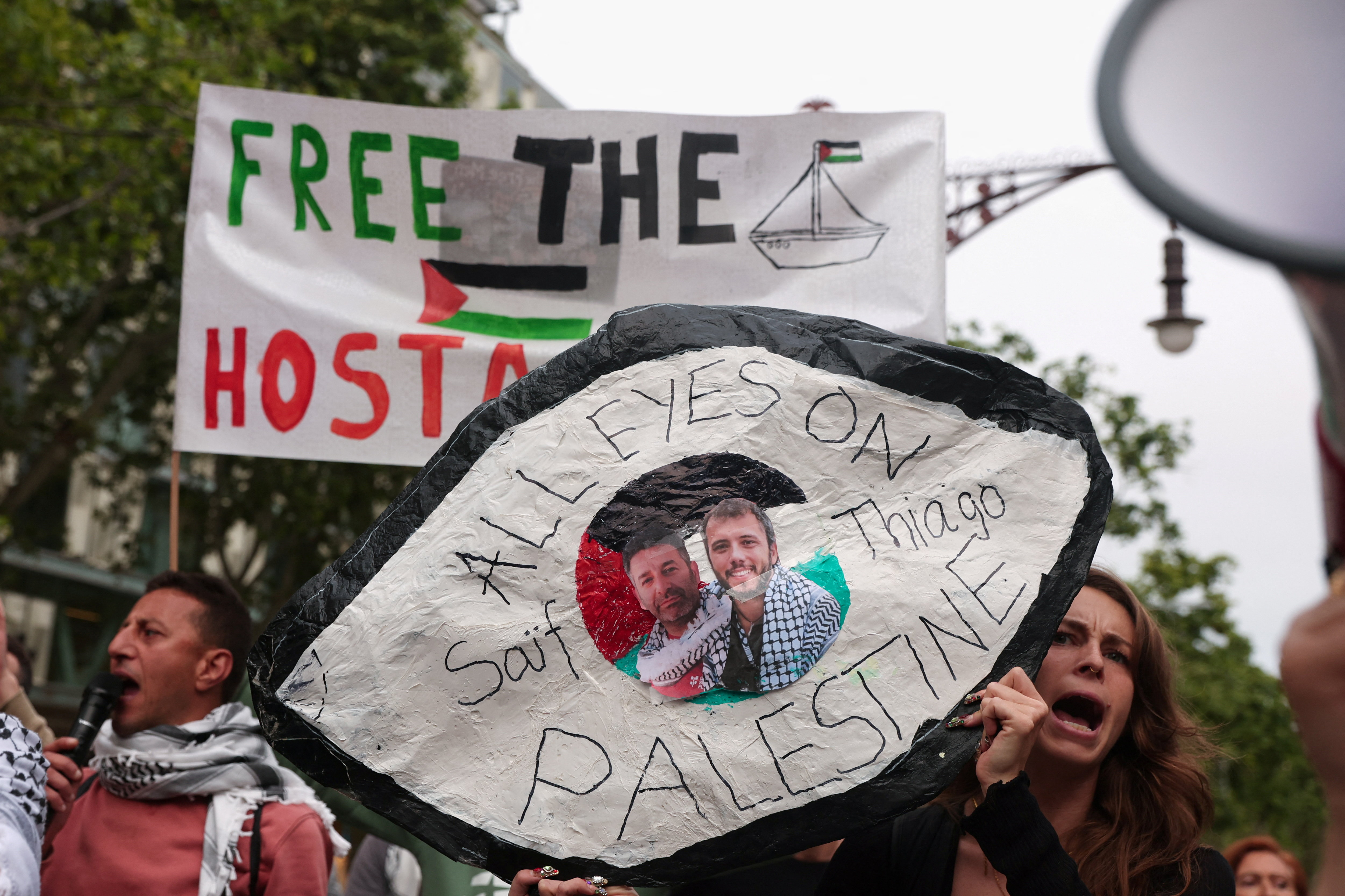 People gather in front of the European Commission office
